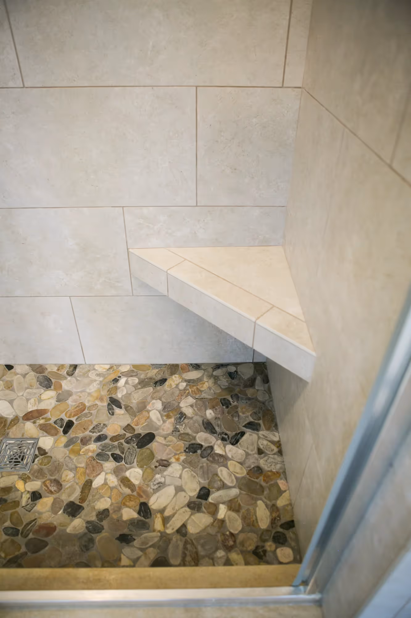 Bathroom countertop with dual sinks and granite surface.