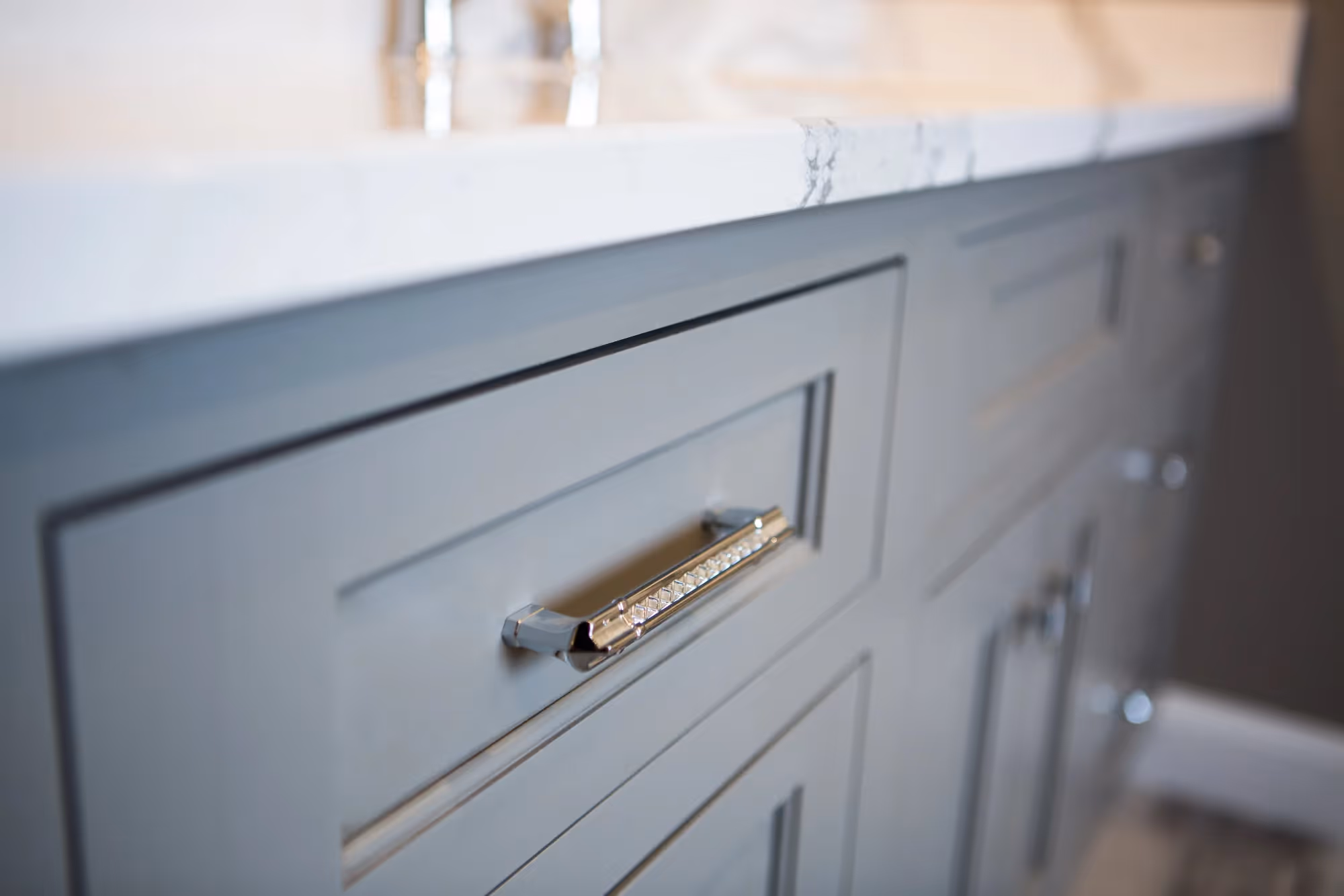 White kitchen drawers with modern hardware
