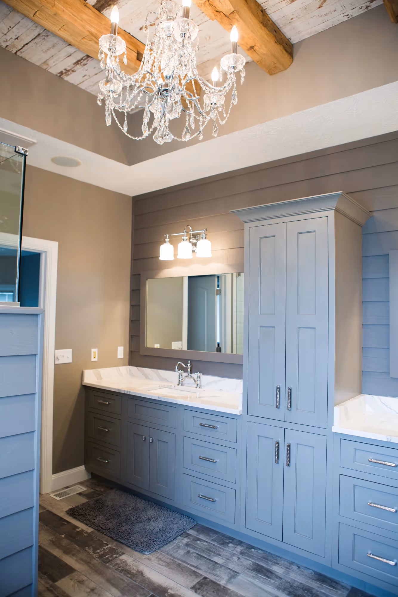 Bedroom with upholstered bed and blue walls