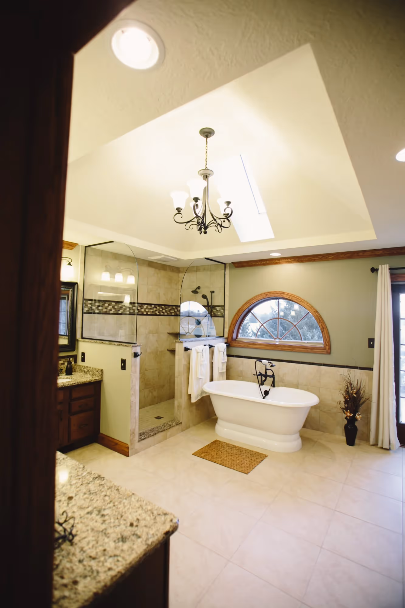 Bathroom vanity area with mirror and lights