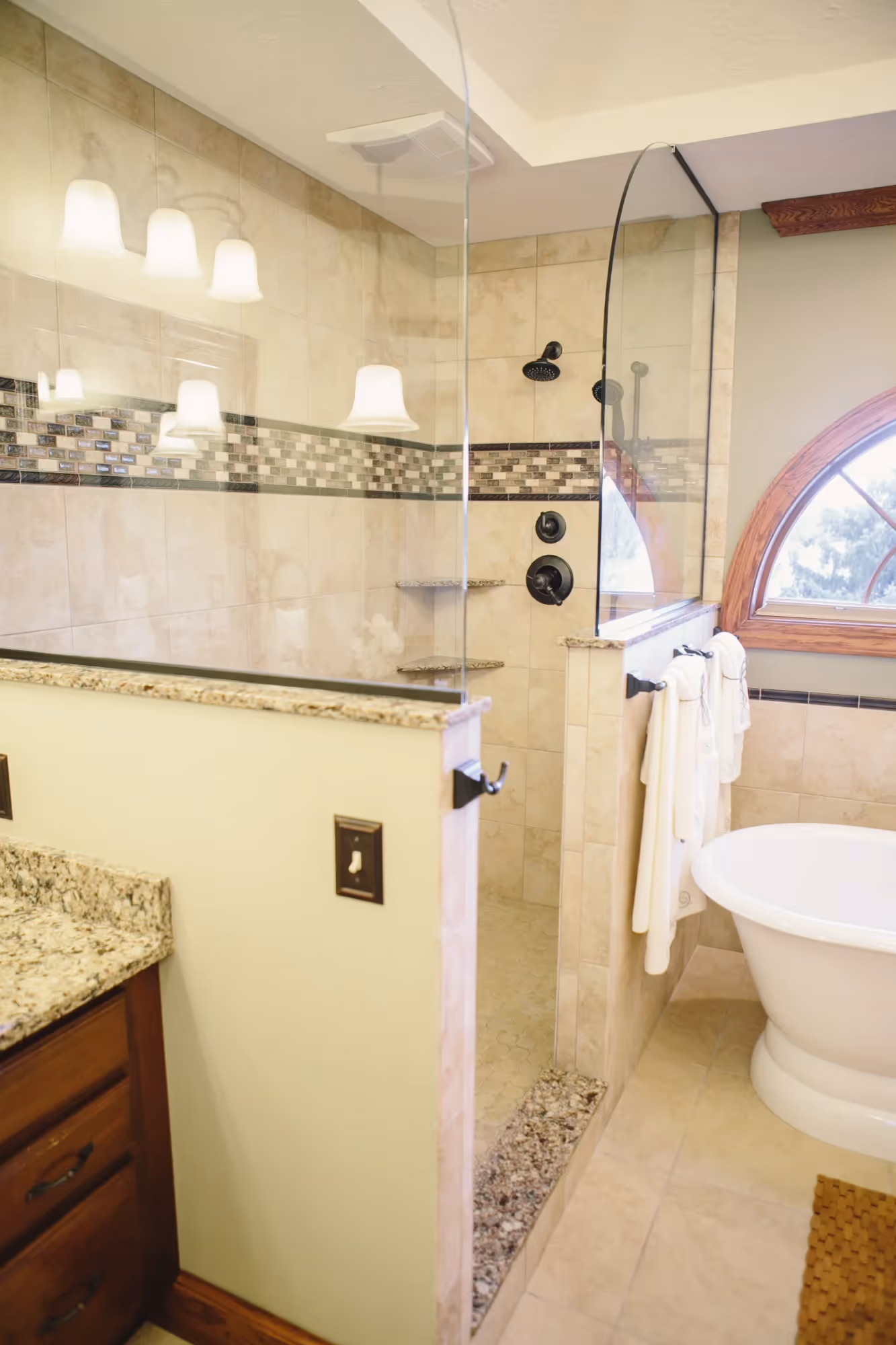 Bright bathroom with white vanity and mirror