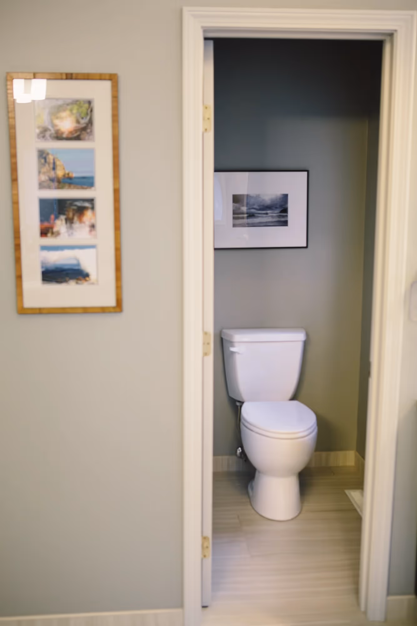Small restroom with toilet and beige walls.
