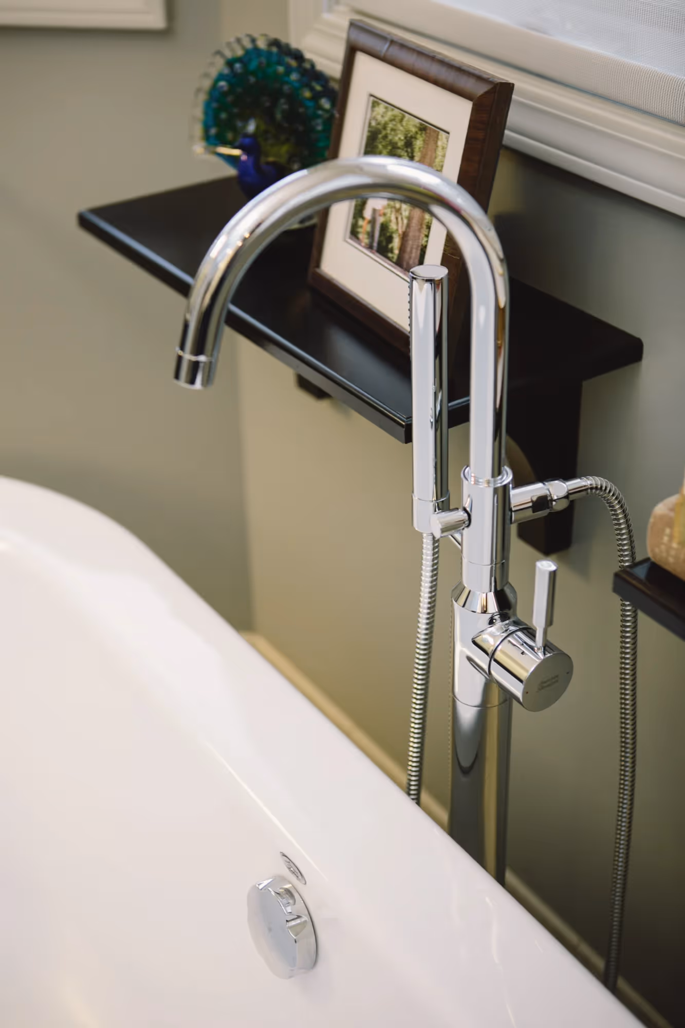 Accessible bathroom with handrails near the toilet.