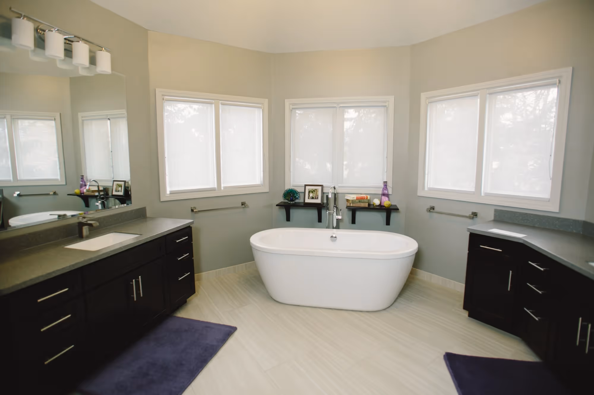 Luxury bathroom with freestanding bathtub and bay windows