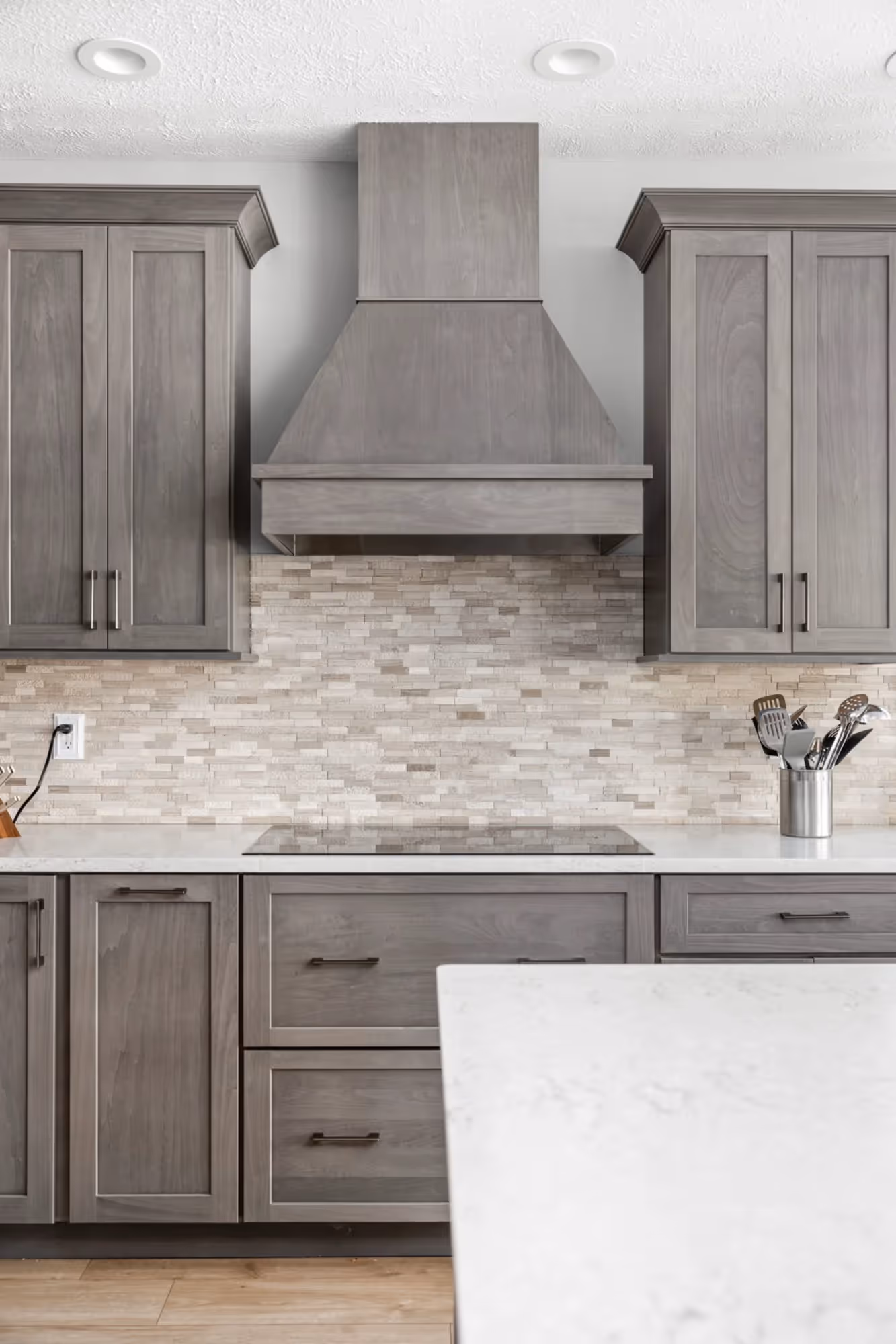 Kitchen sink with gray cabinetry
