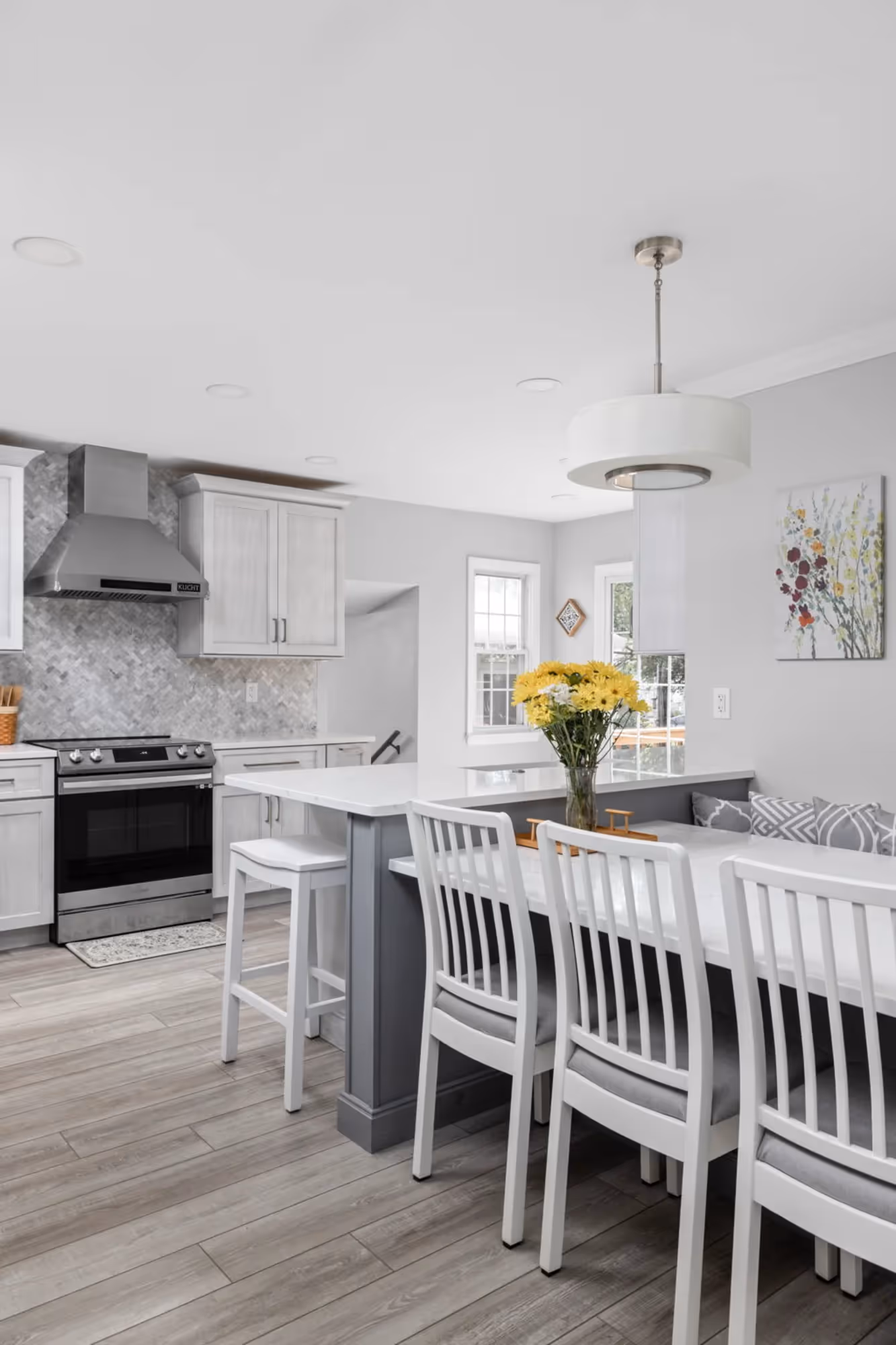 Dining area with modern pendant lighting and seating for six