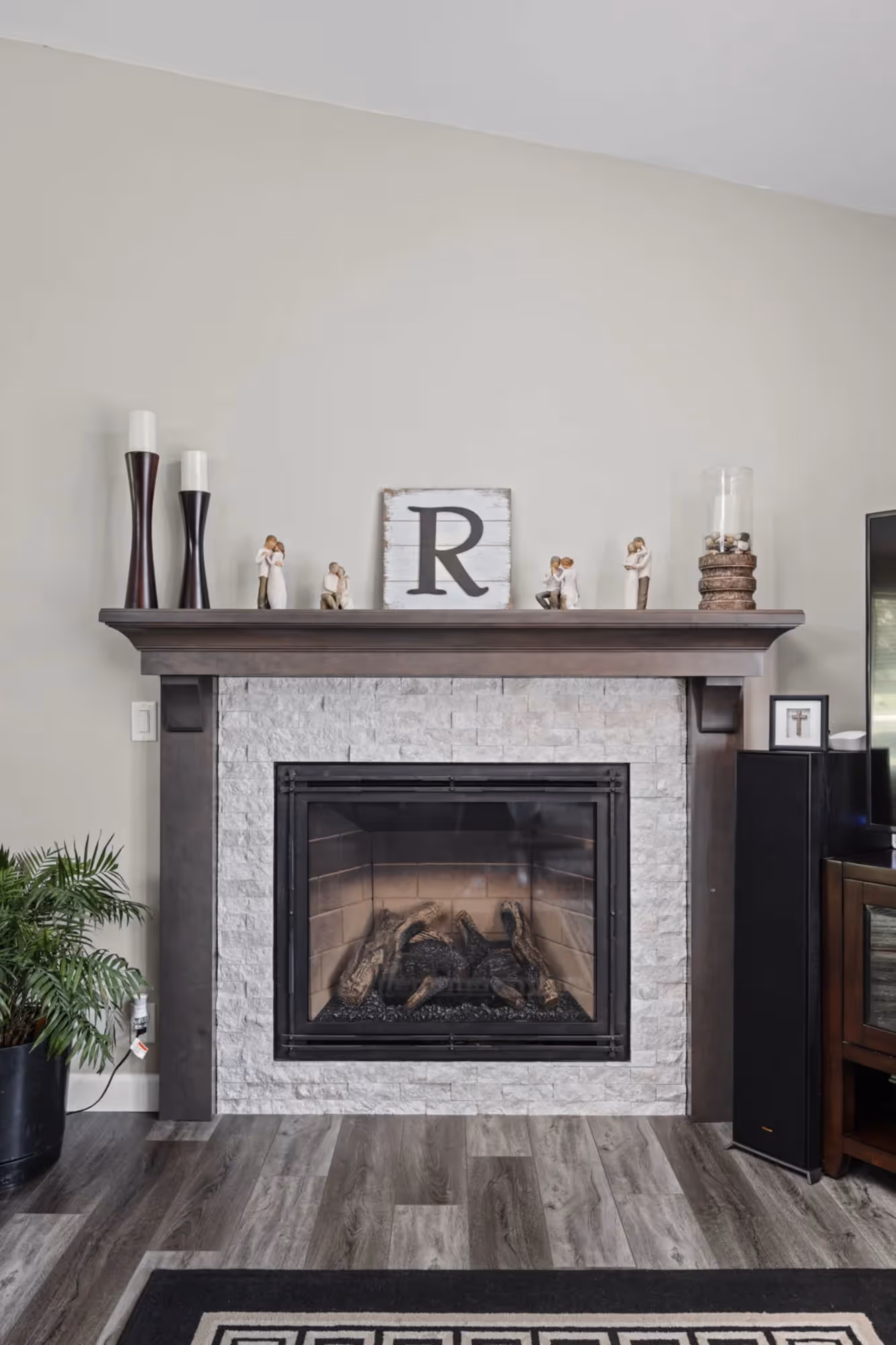 Living room fireplace with wall-mounted TV