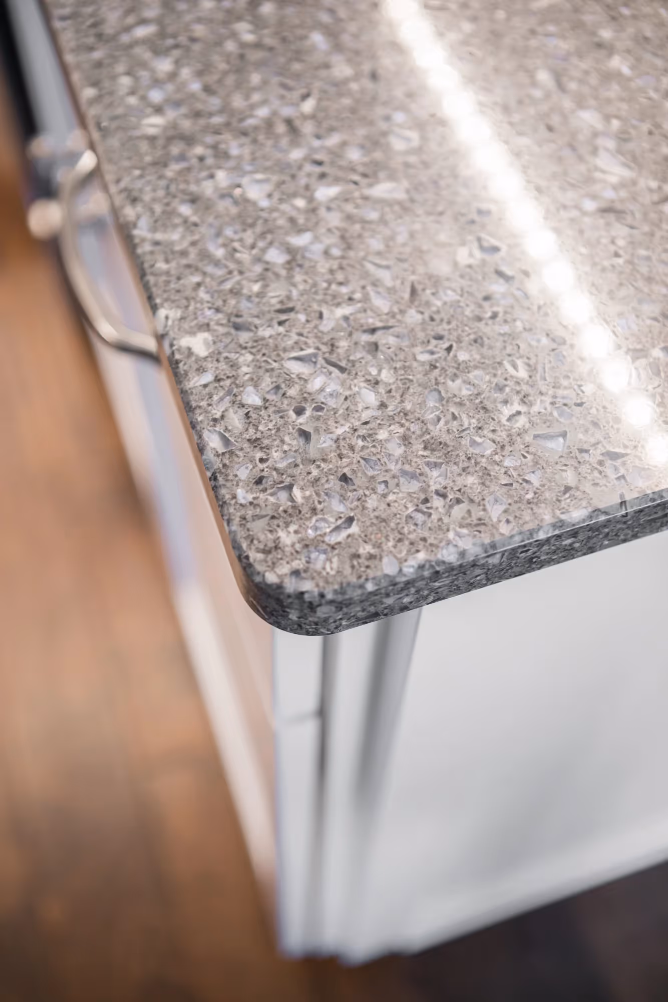 Close-up of speckled granite countertop edge