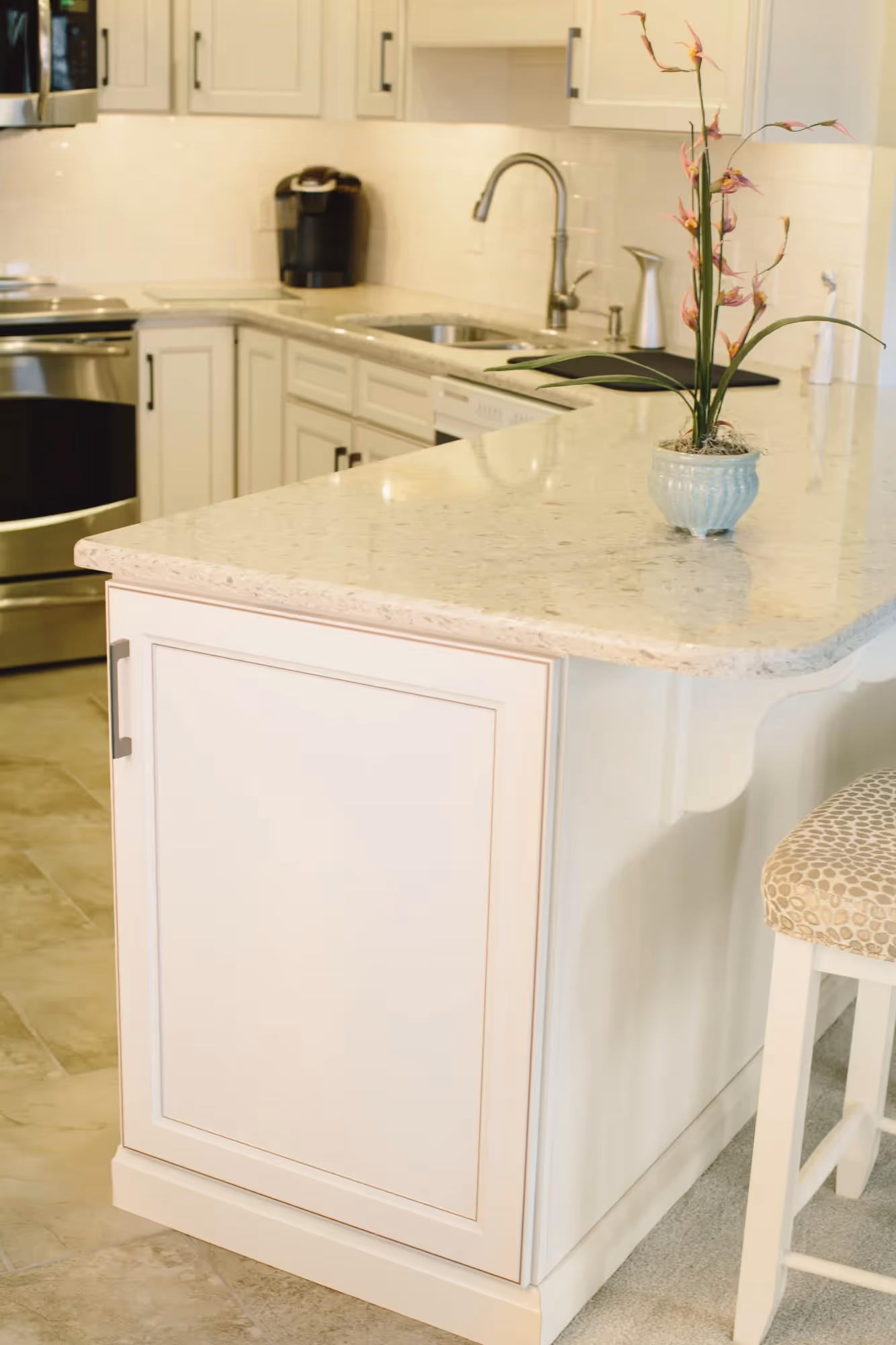 White bathroom vanity with sink and mirror
