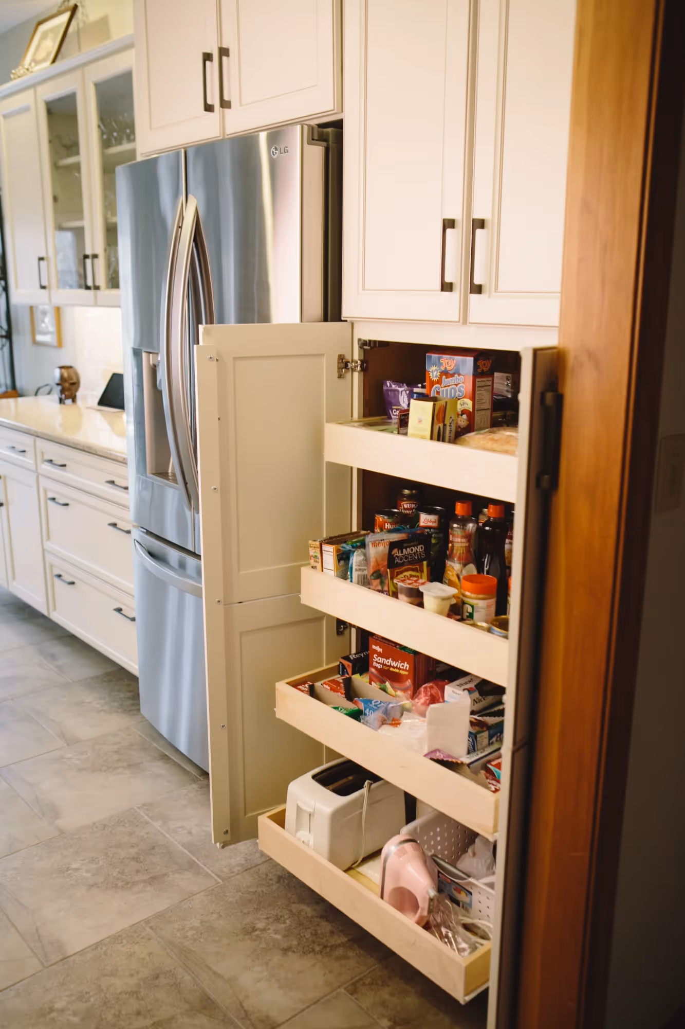 Walk-in pantry with shelves and storage bins