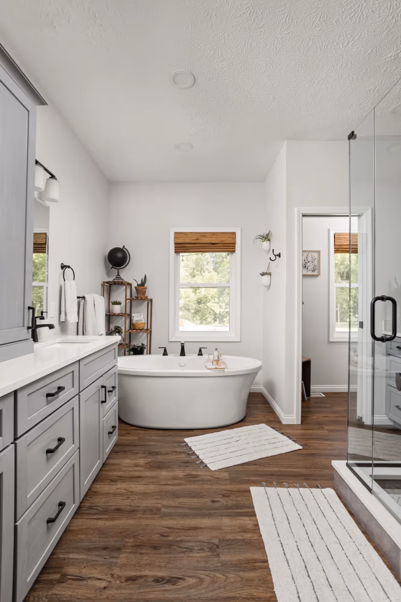 Bright bathroom with wood flooring