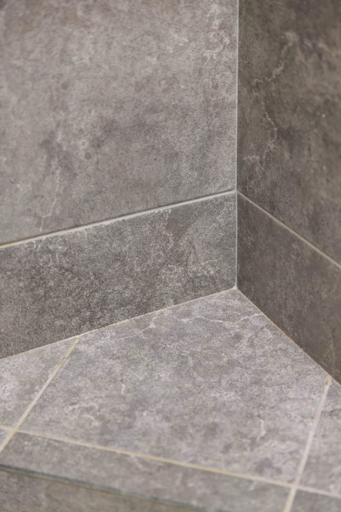 Walk-in shower with tile walls