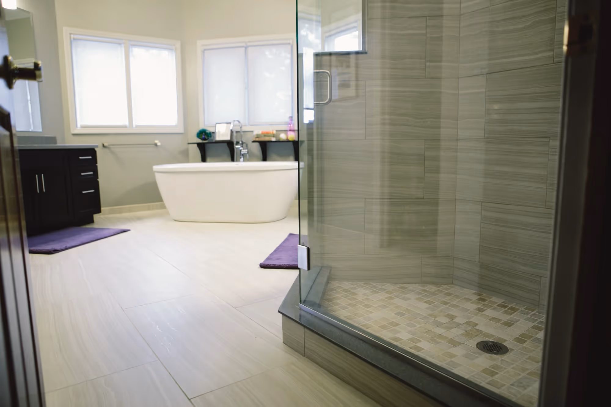 Spacious bathroom with a large glass shower