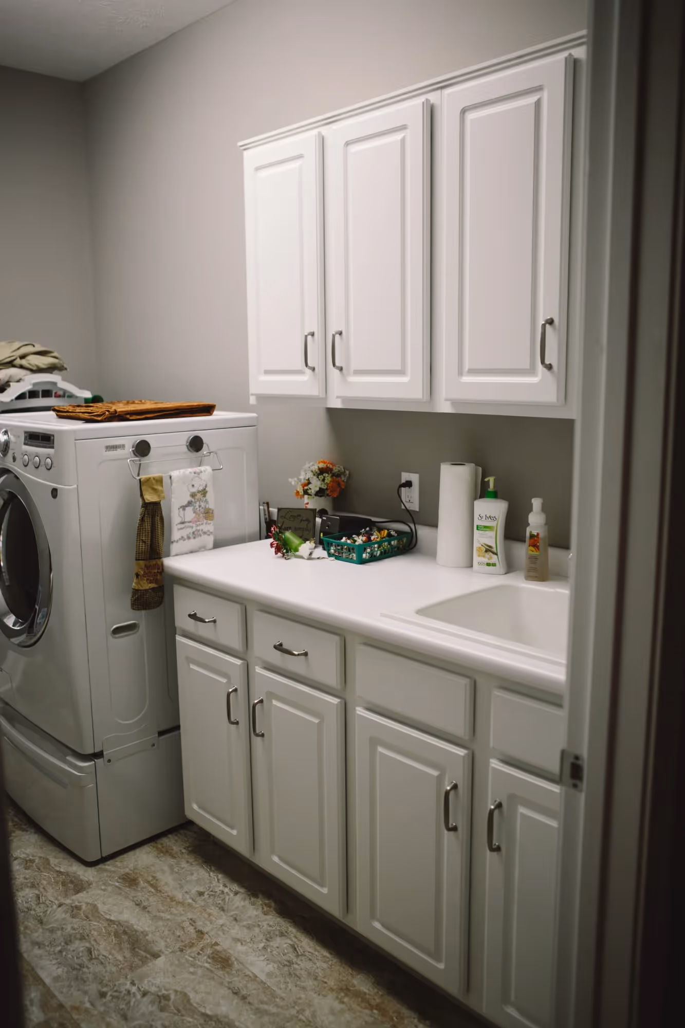 Tall pantry cabinet with pull-out shelves