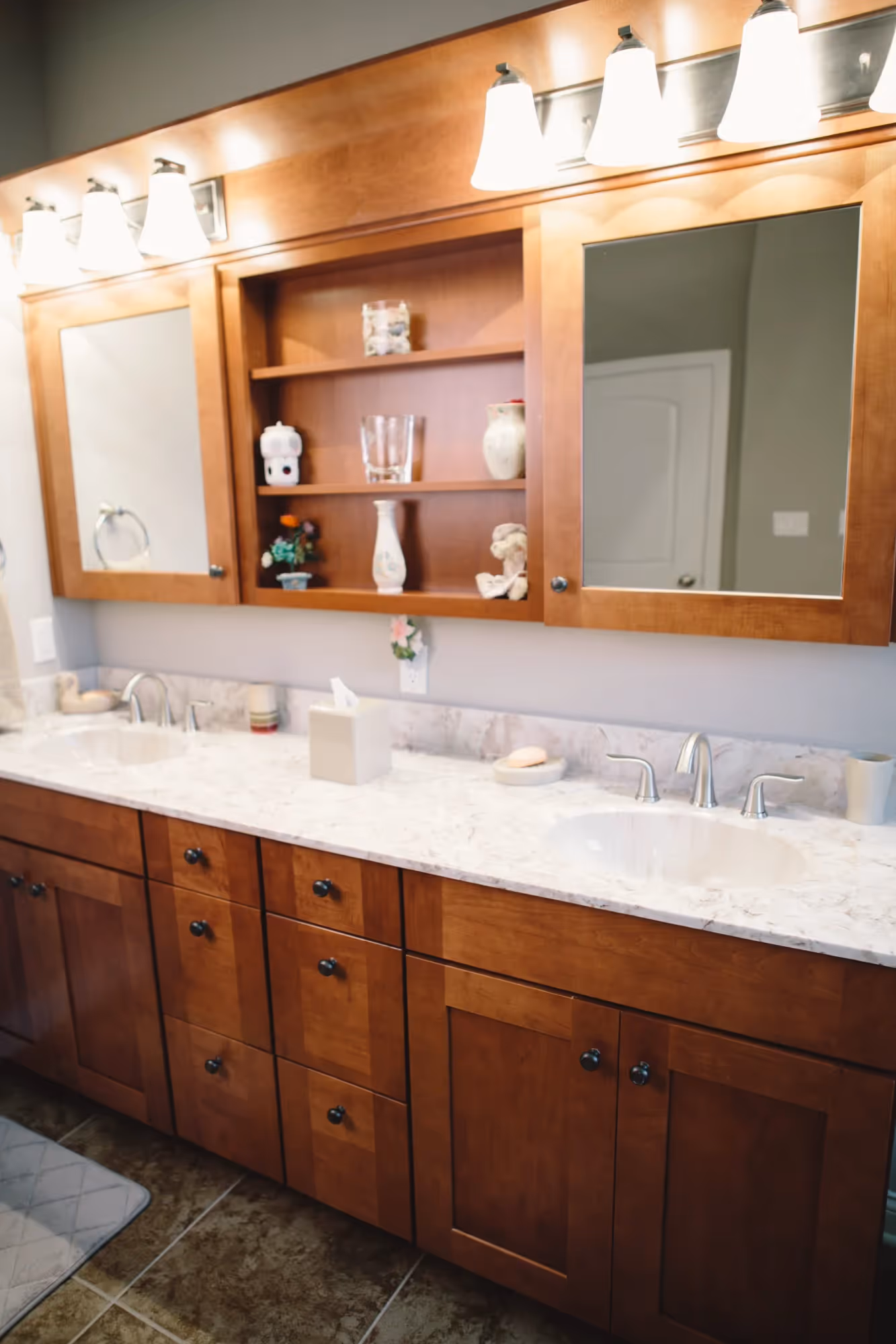 Bathroom vanity with sink and mirror