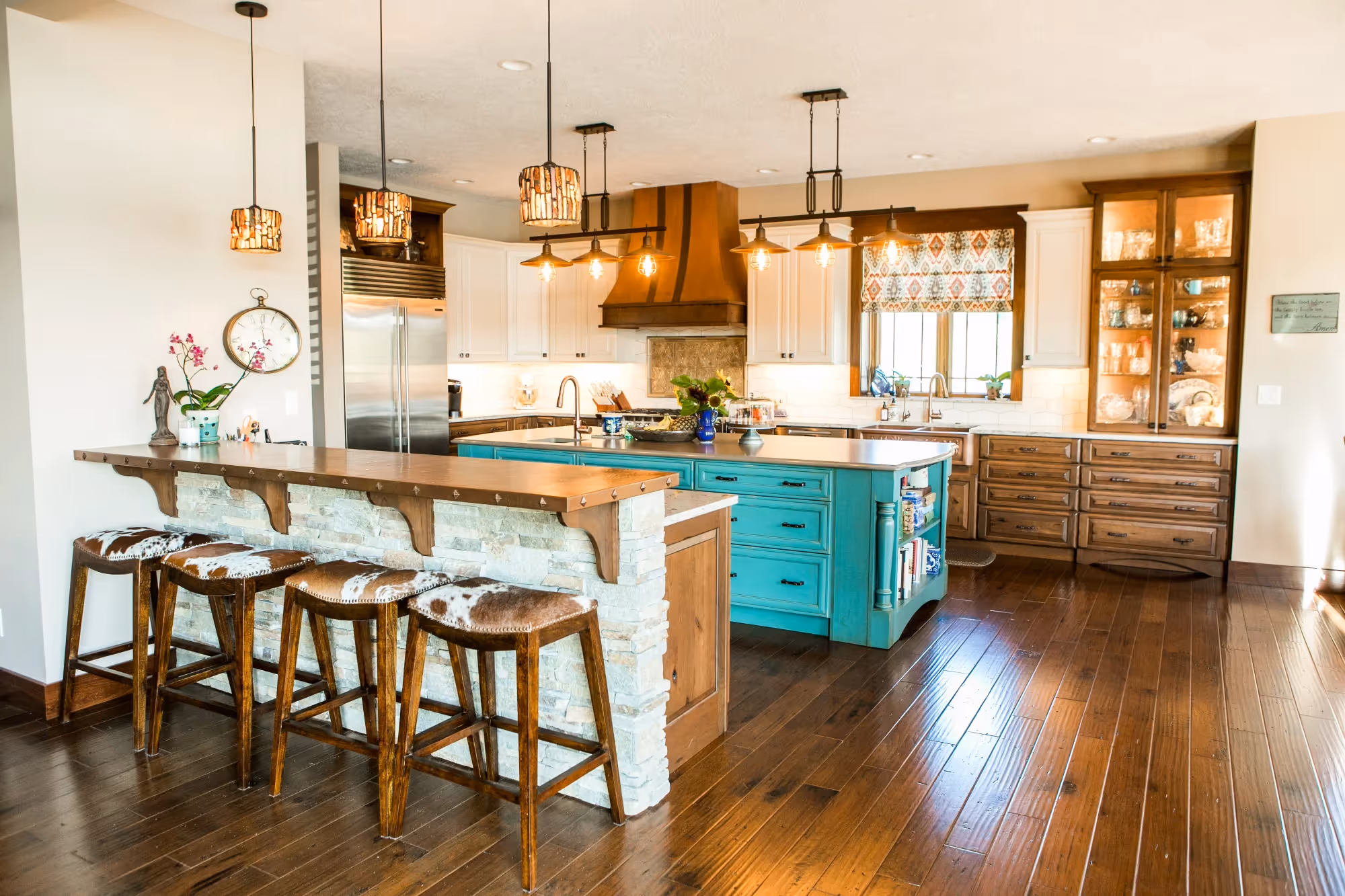 Warm wood kitchen with pendant lighting