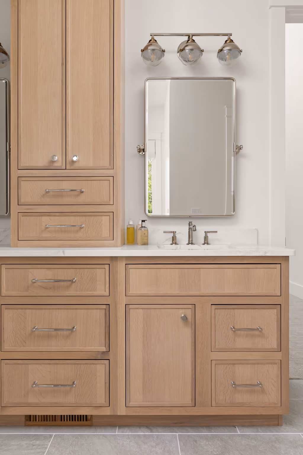 Bathroom vanity with mirror and wall light