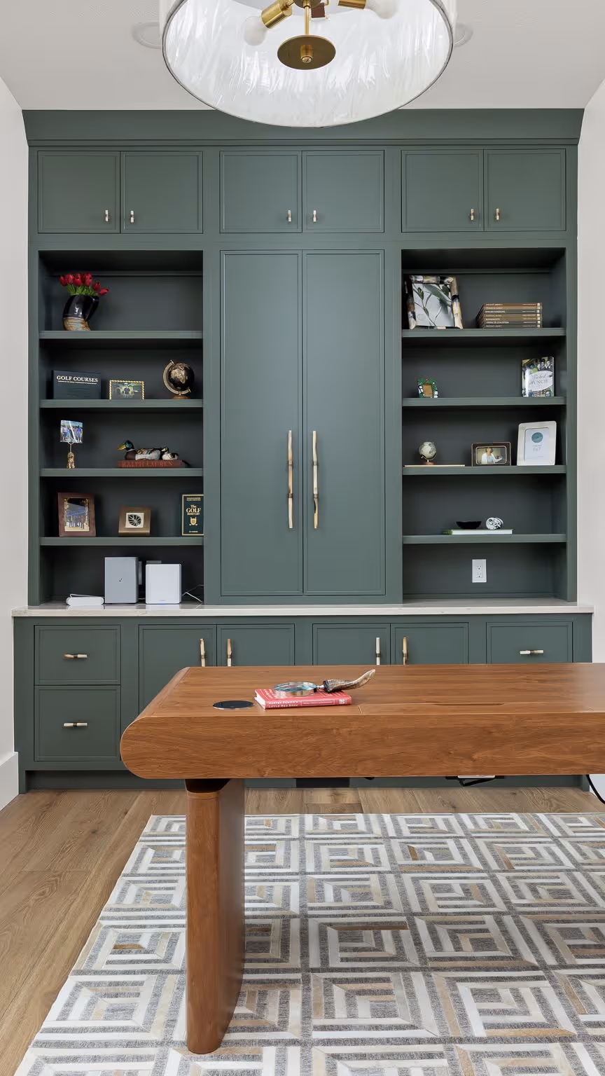 Built-in shelves and desk with pendant light