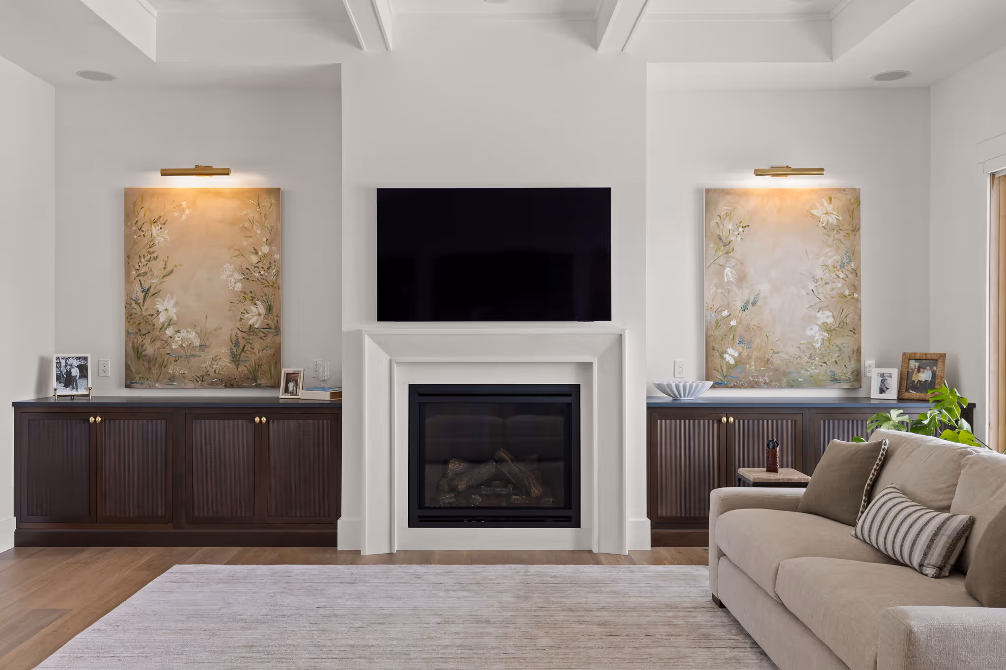 Living room with fireplace and built-in cabinets