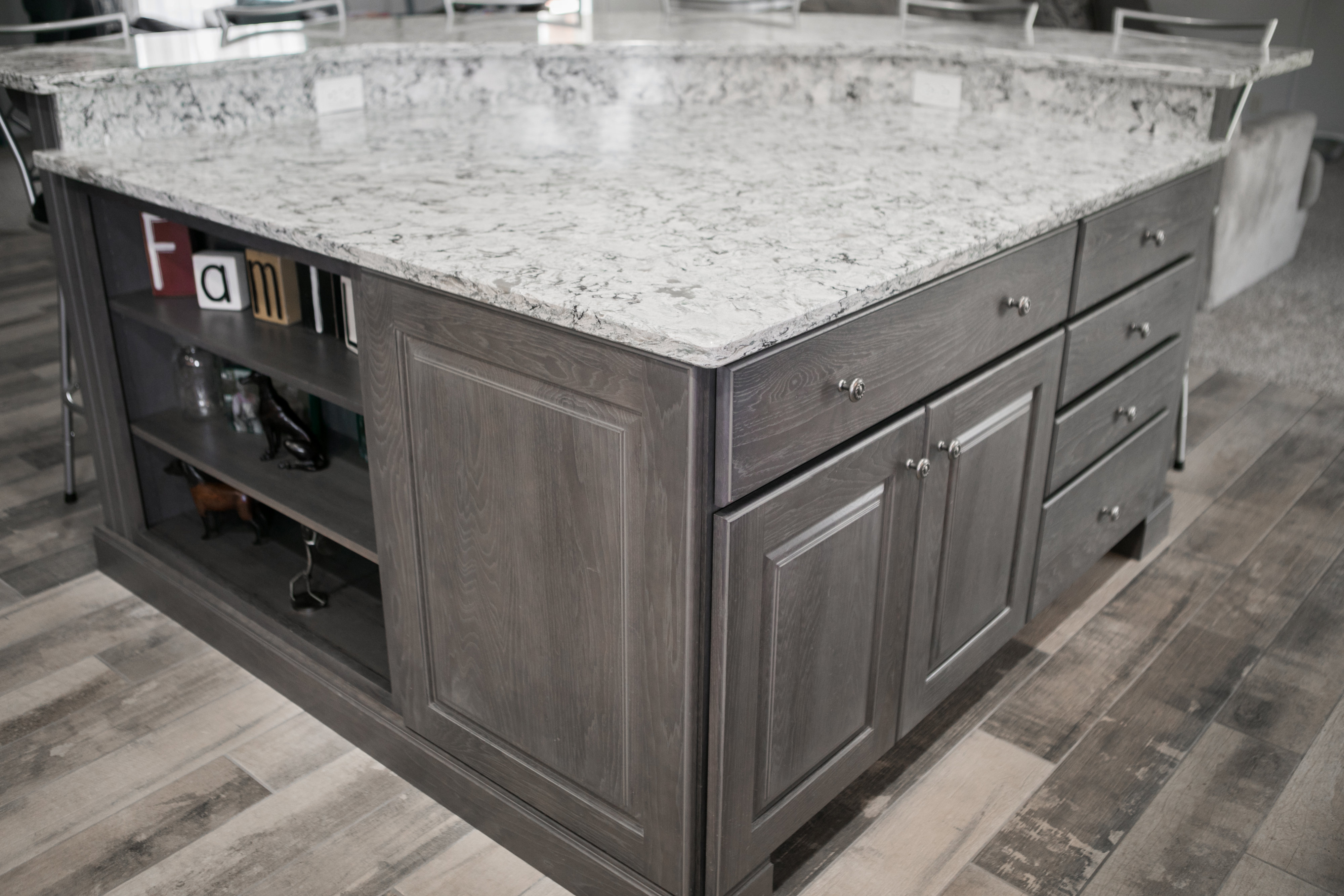 Kitchen with island countertop and built-in oven