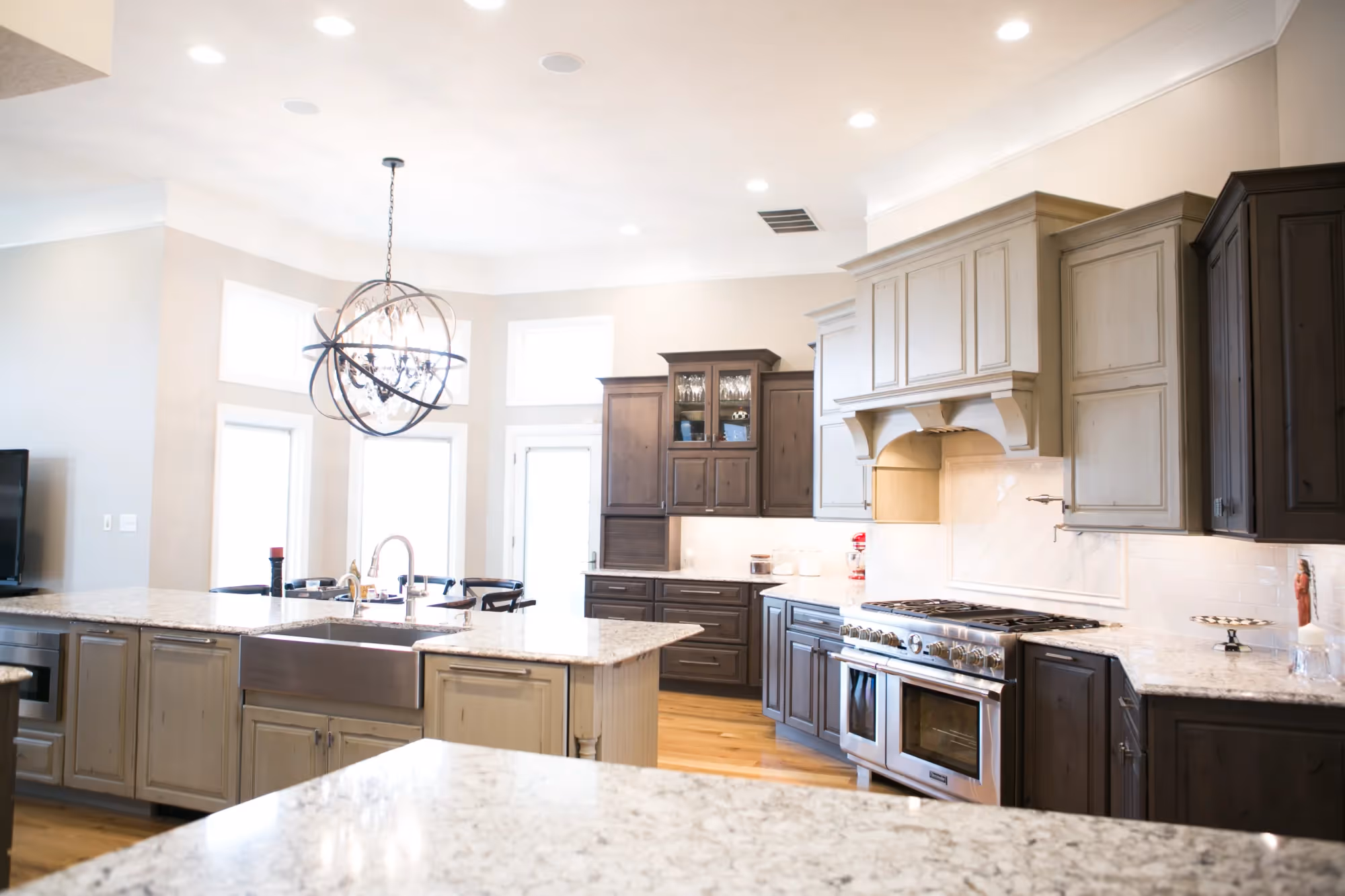 Bright kitchen with white island and seating