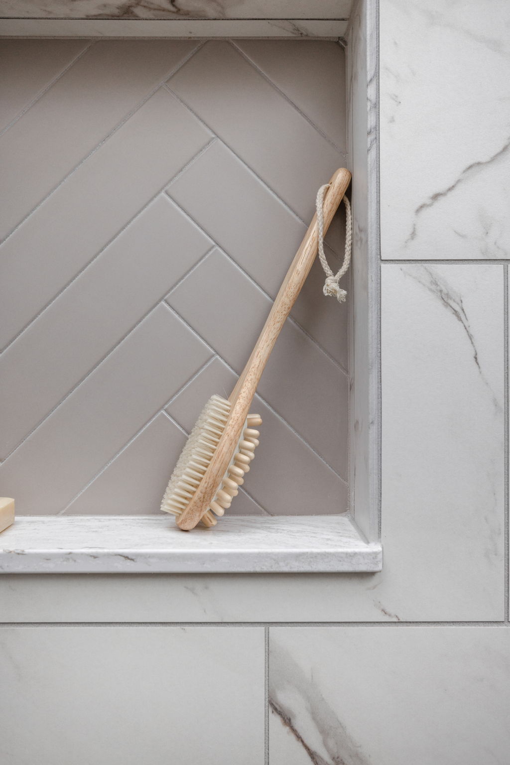 Wall niche with bath brush and soap