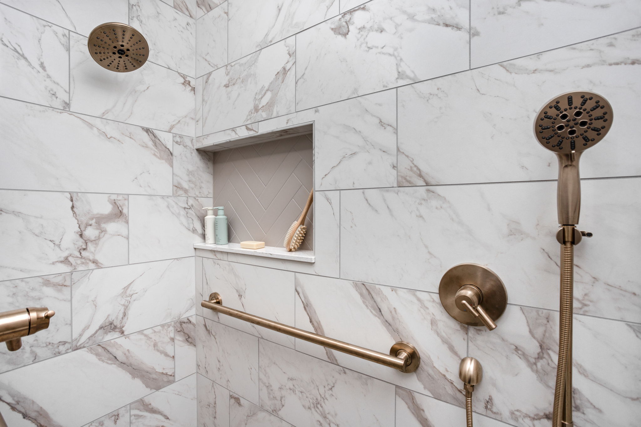 Marble-look counter with gold hardware and accessories