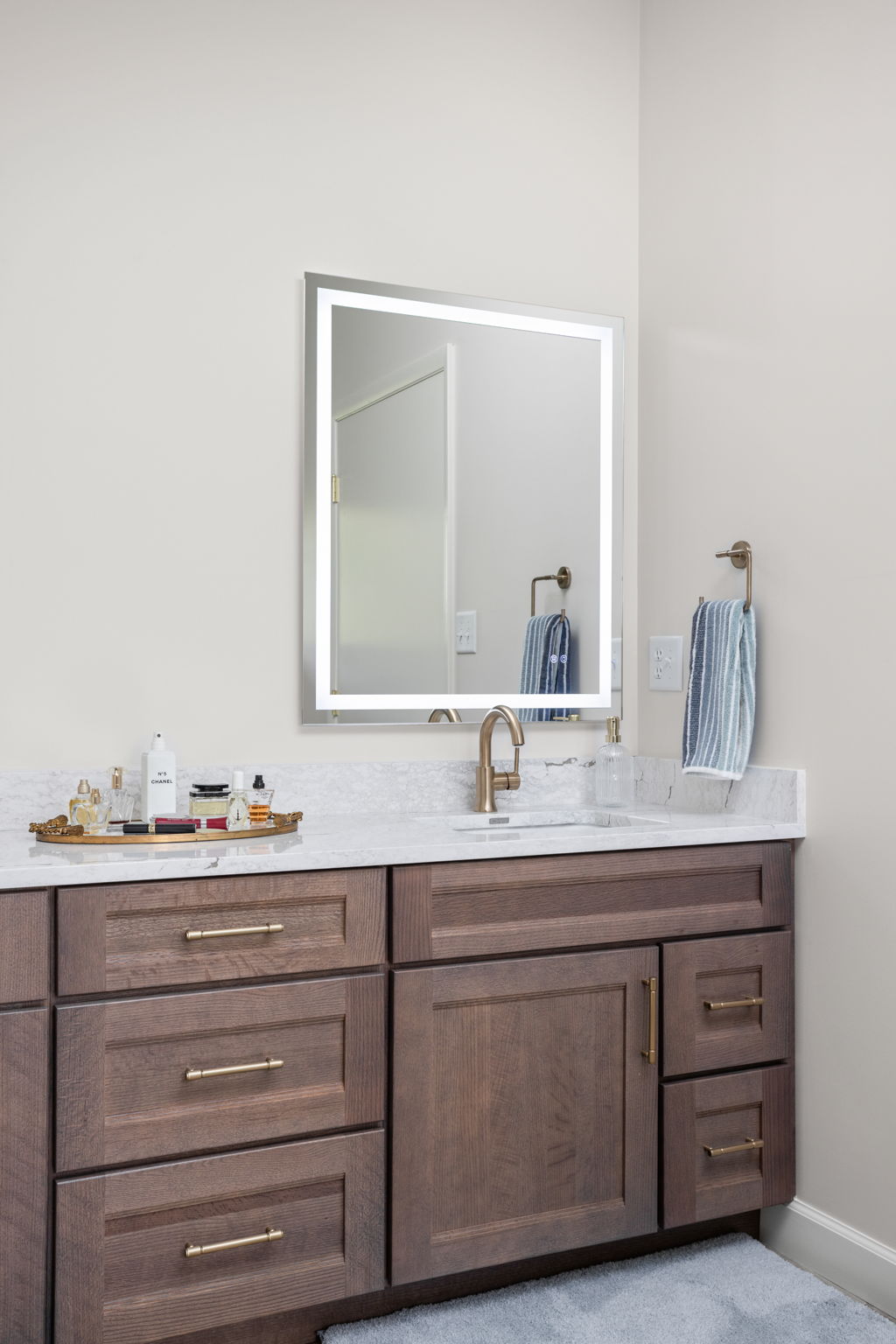 Bathroom vanity with mirror and wall lights