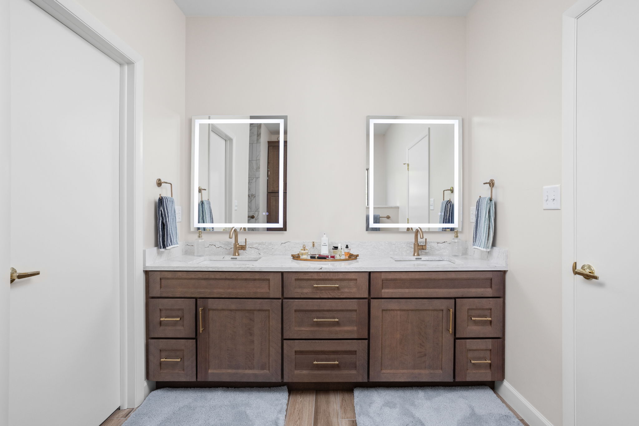 Double-sink bathroom vanity with mirrors