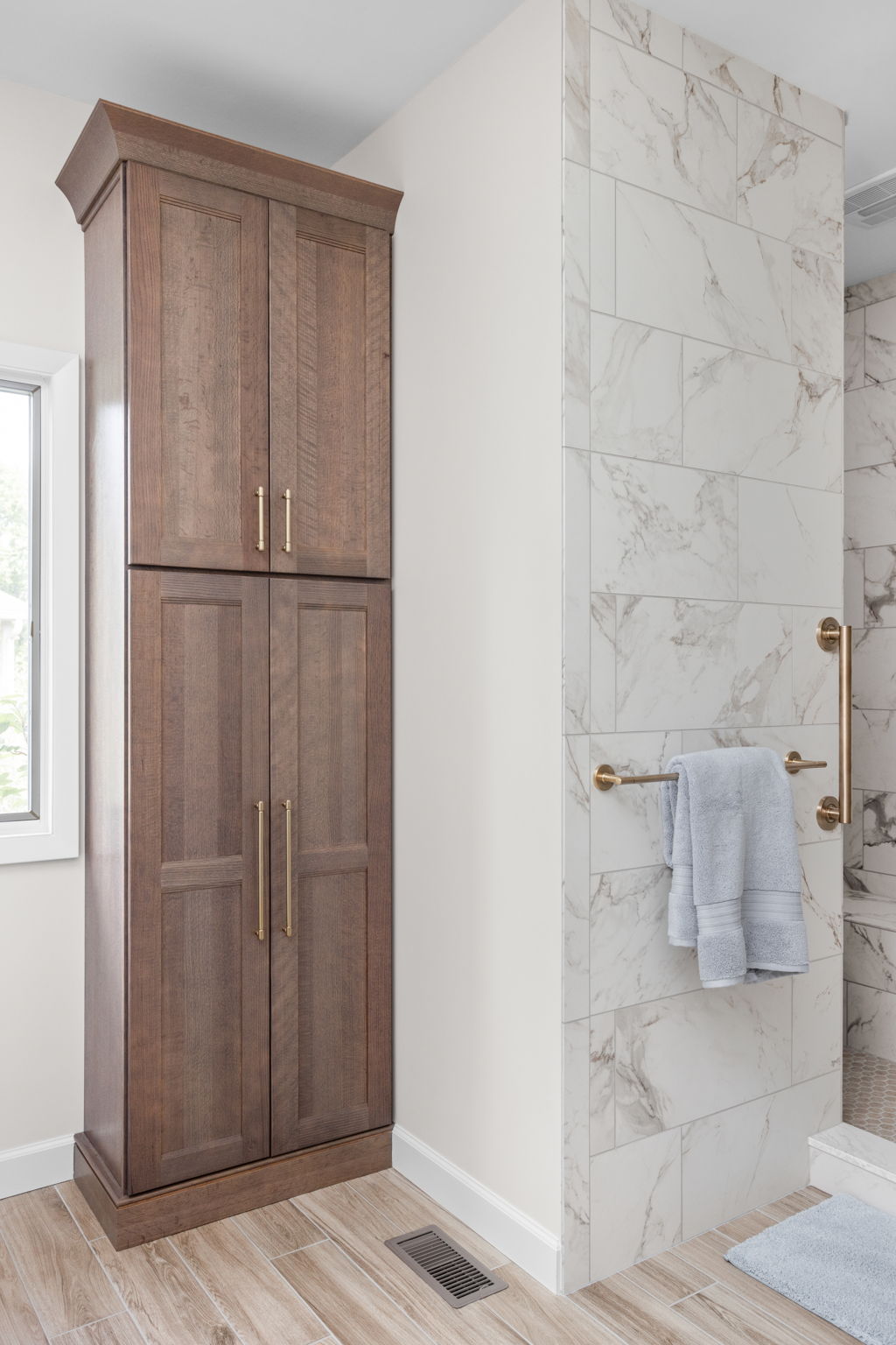 Wooden door with marble accent wall