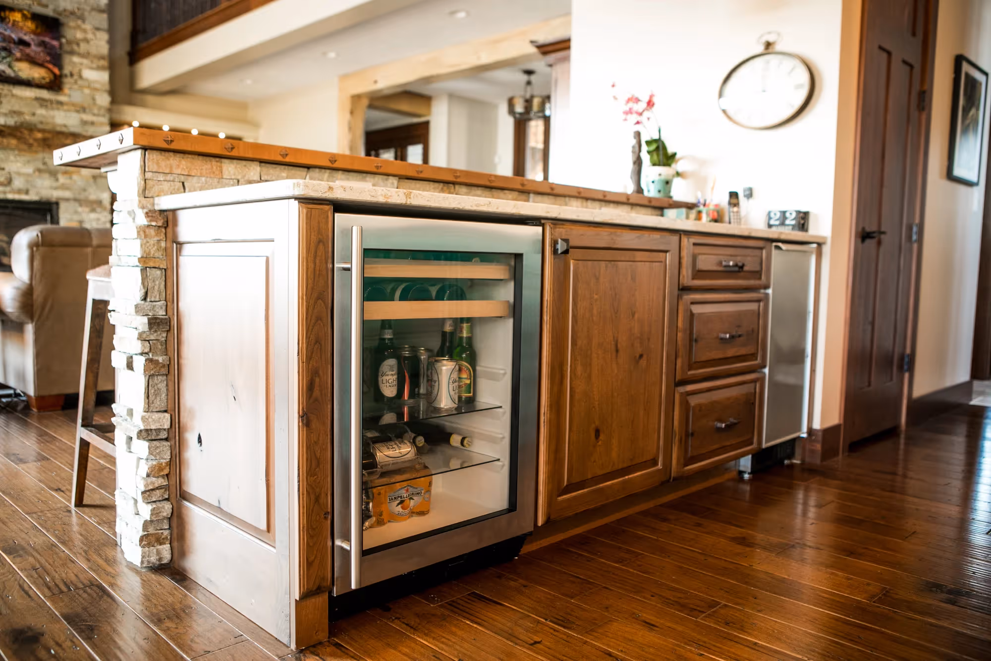 Narrow galley kitchen with wood finishes