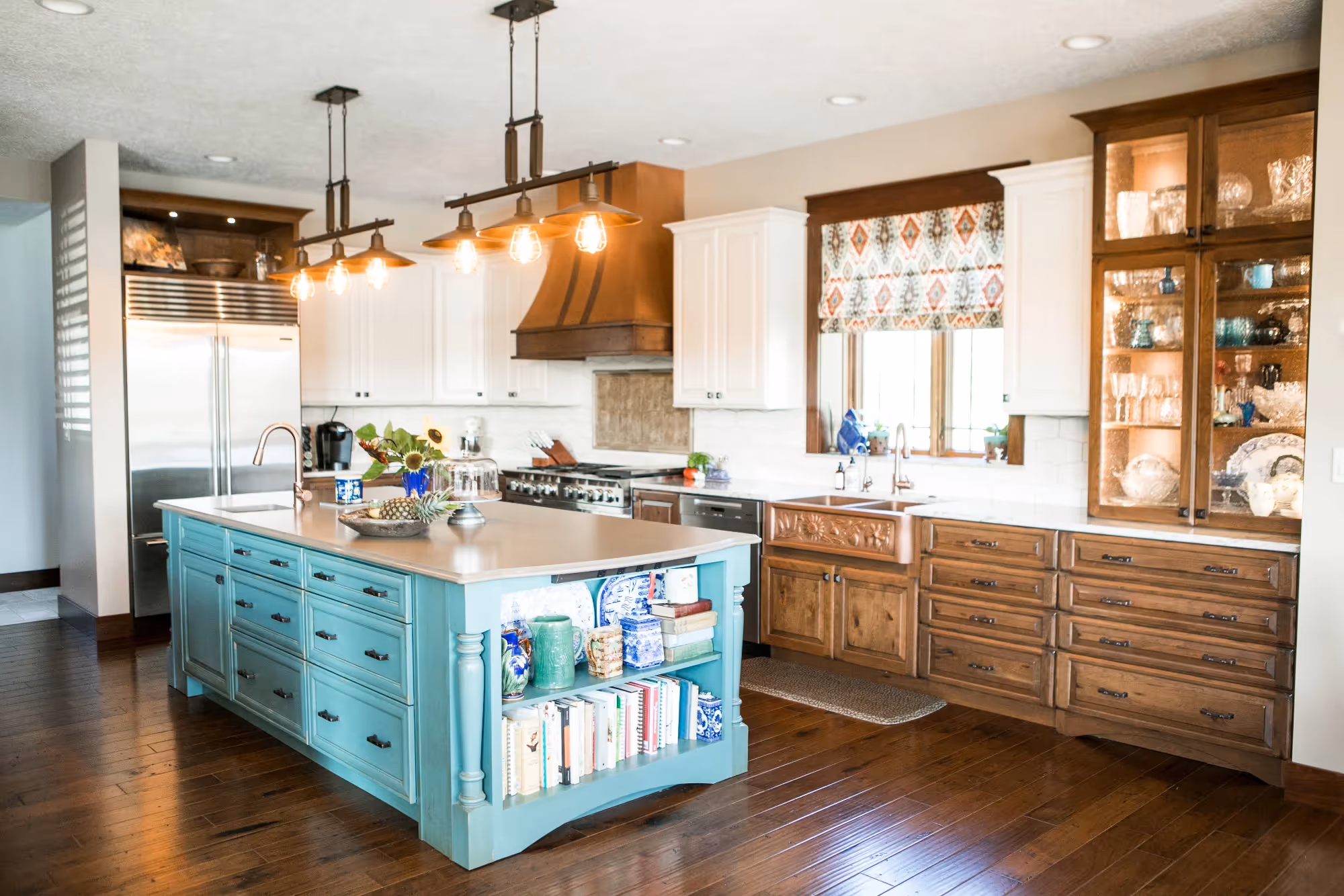 Bright kitchen with wood and white cabinetry