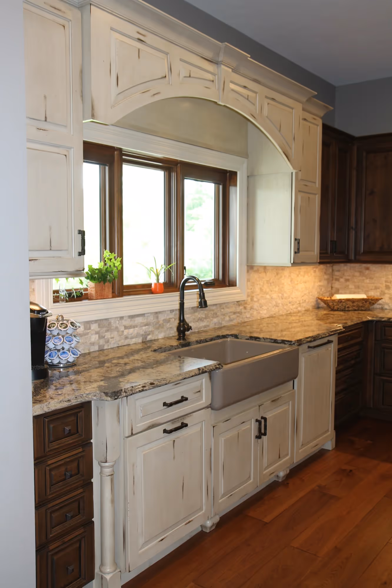 Double-sink bathroom vanity with wooden flooring