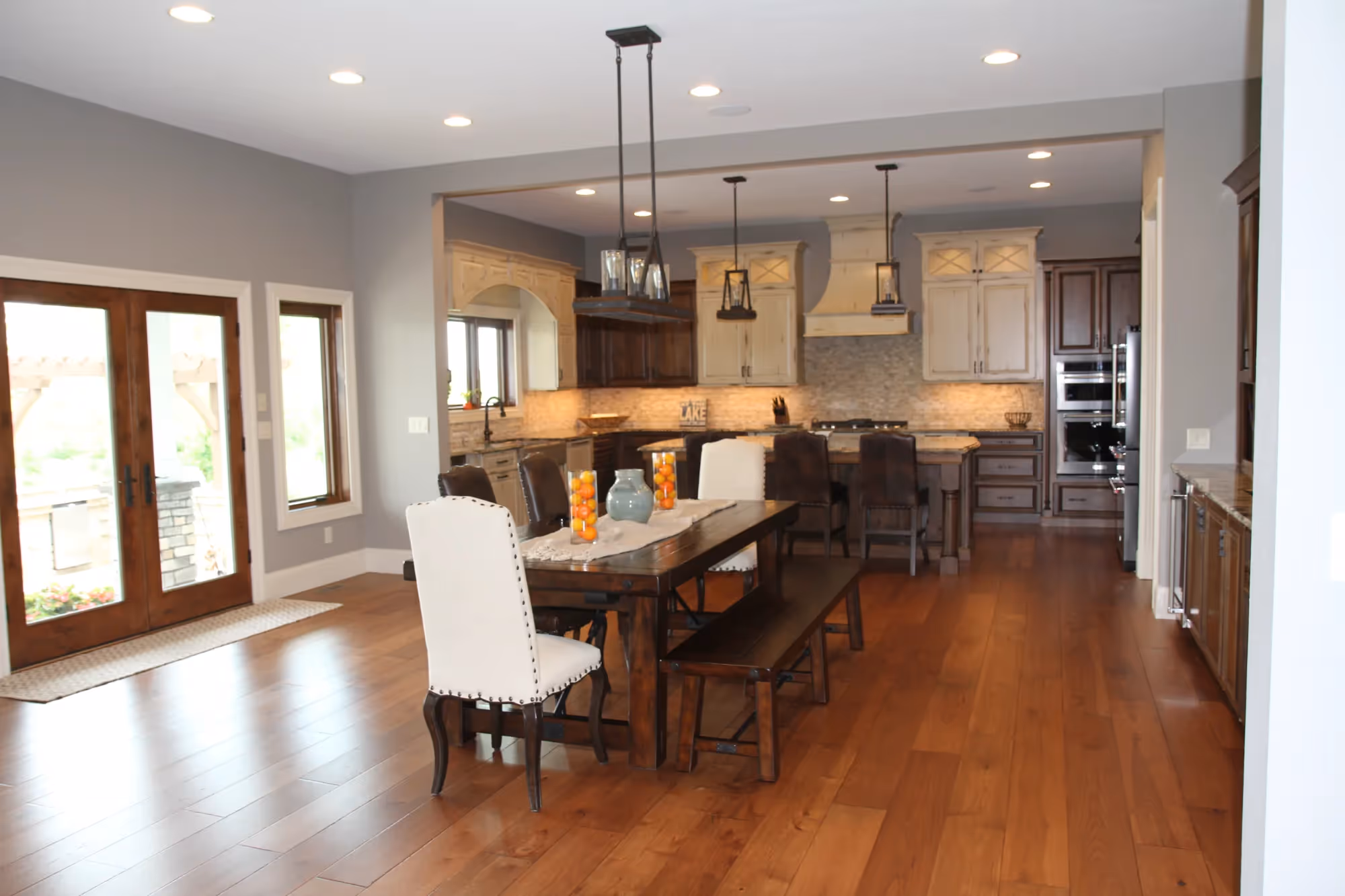 Spacious kitchen with dining area and wooden floor