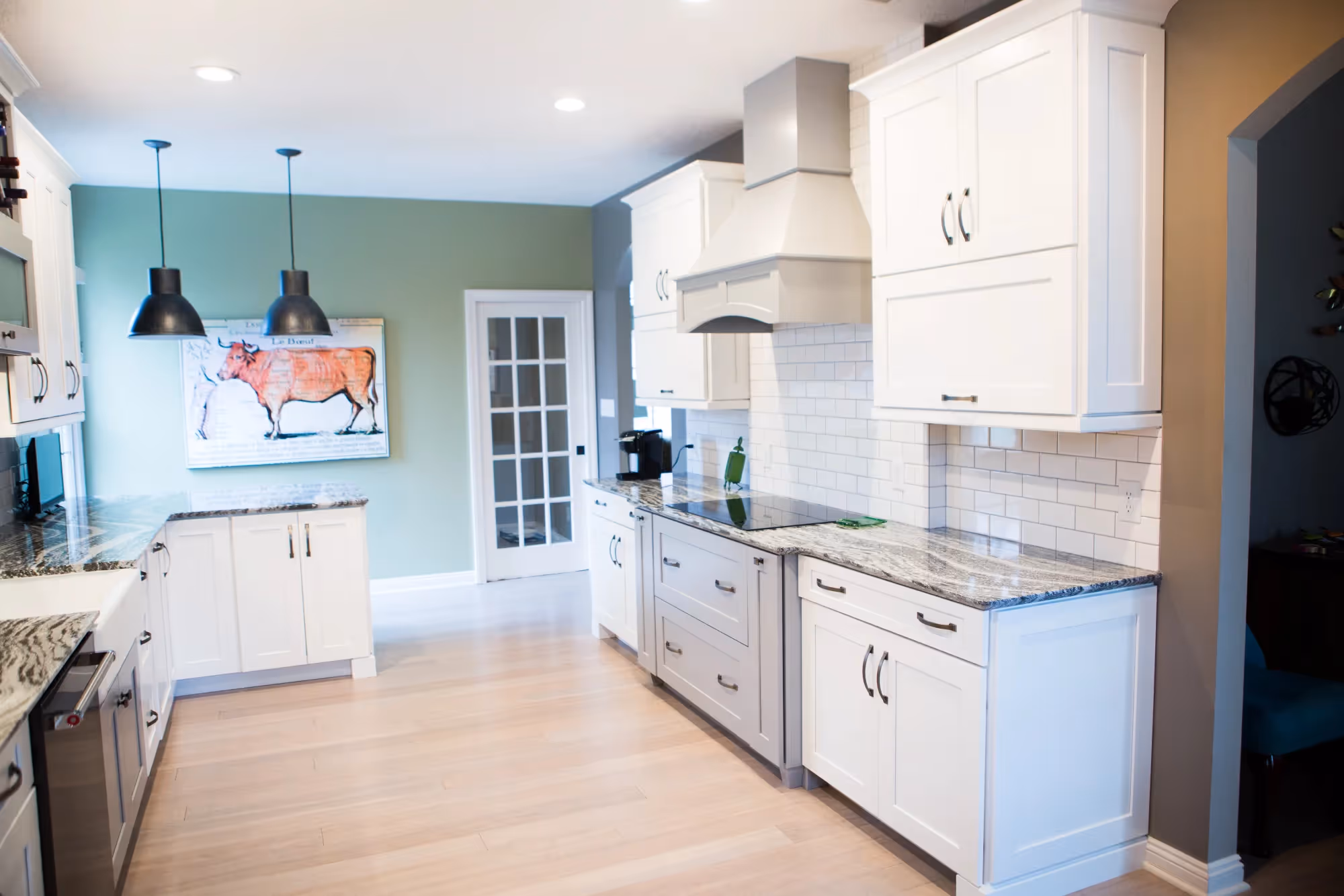 Bright kitchen with peninsula and stools