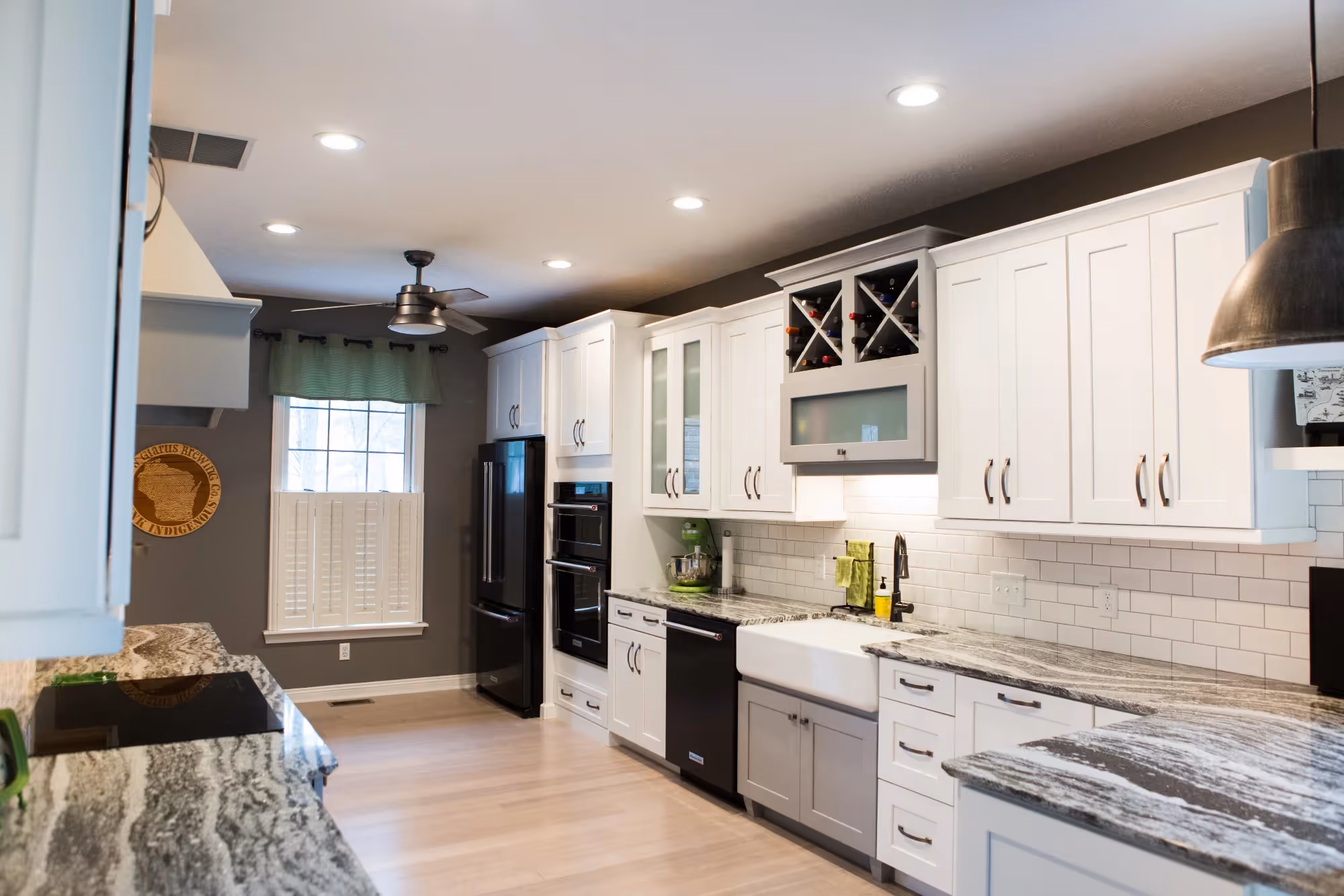 Modern white kitchen with pendant lights