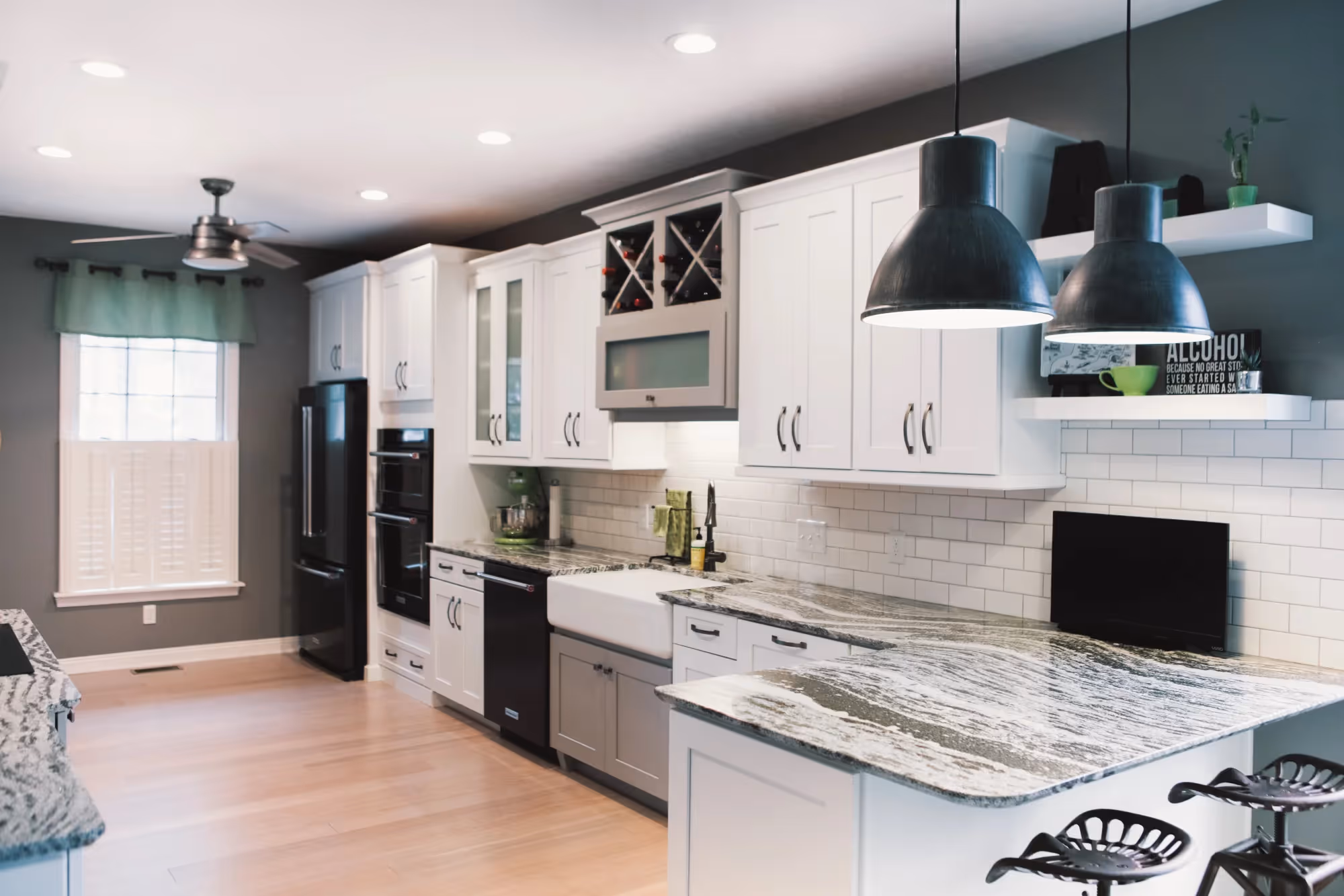 Contemporary kitchen with peninsula and pendant lighting