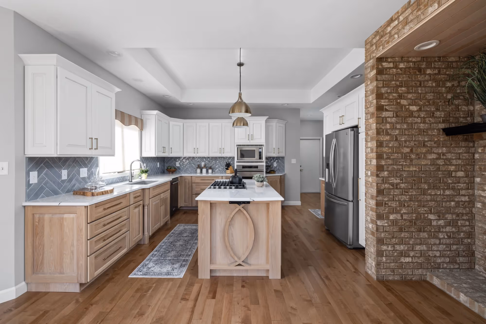 Open-concept kitchen with wood cabinets