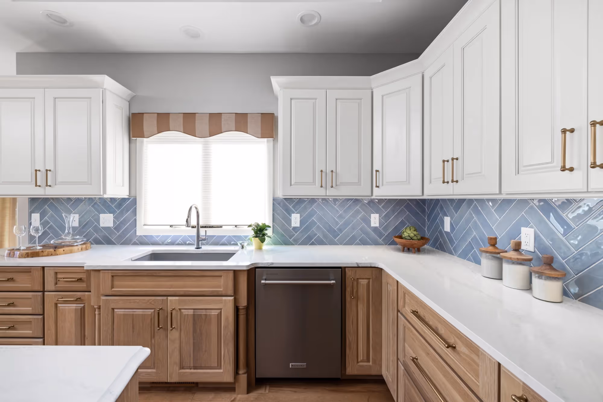 Bright kitchen with white cabinets and island