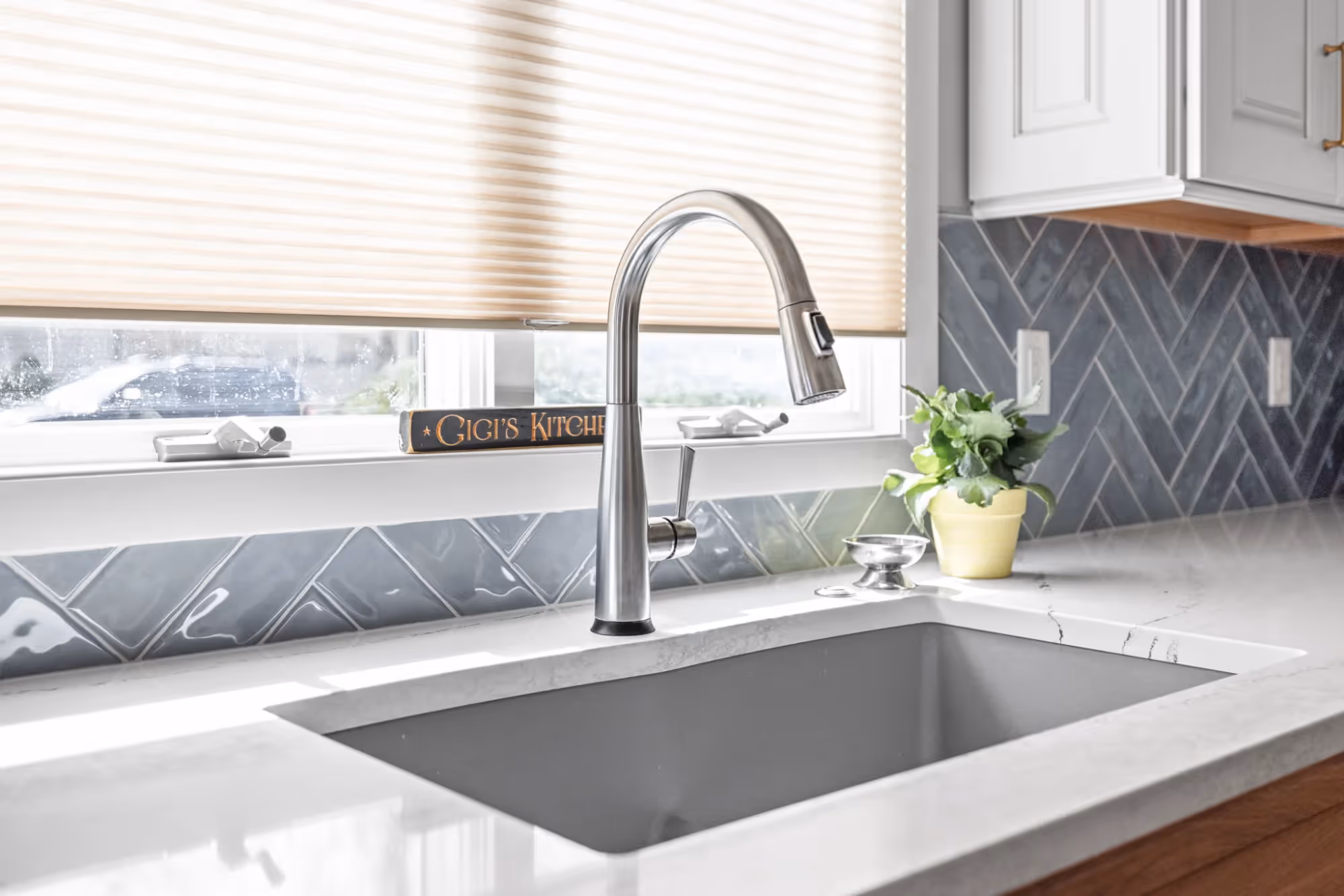 Kitchen sink with modern faucet
