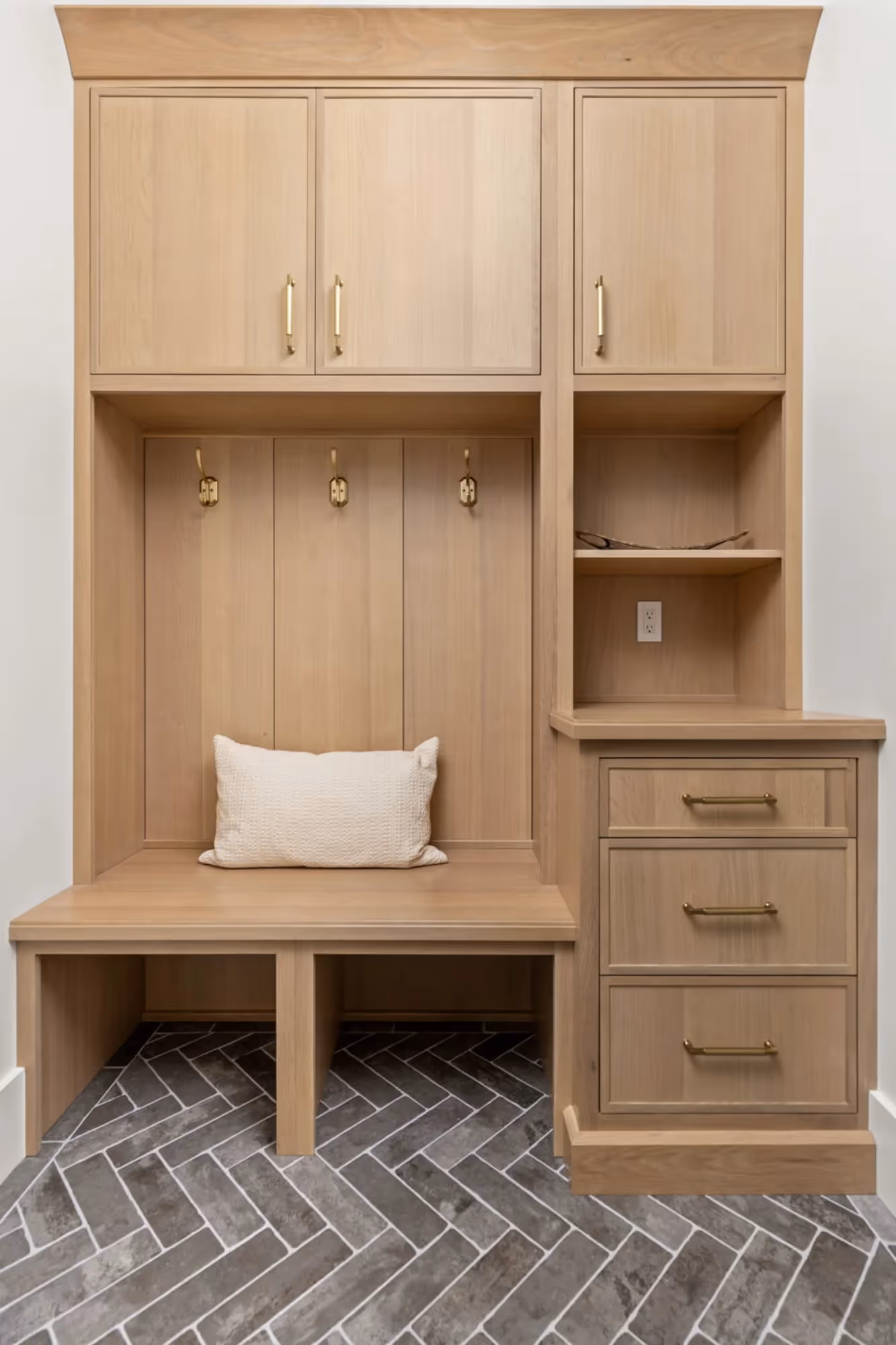 Built-in wooden desk with shelves and drawers