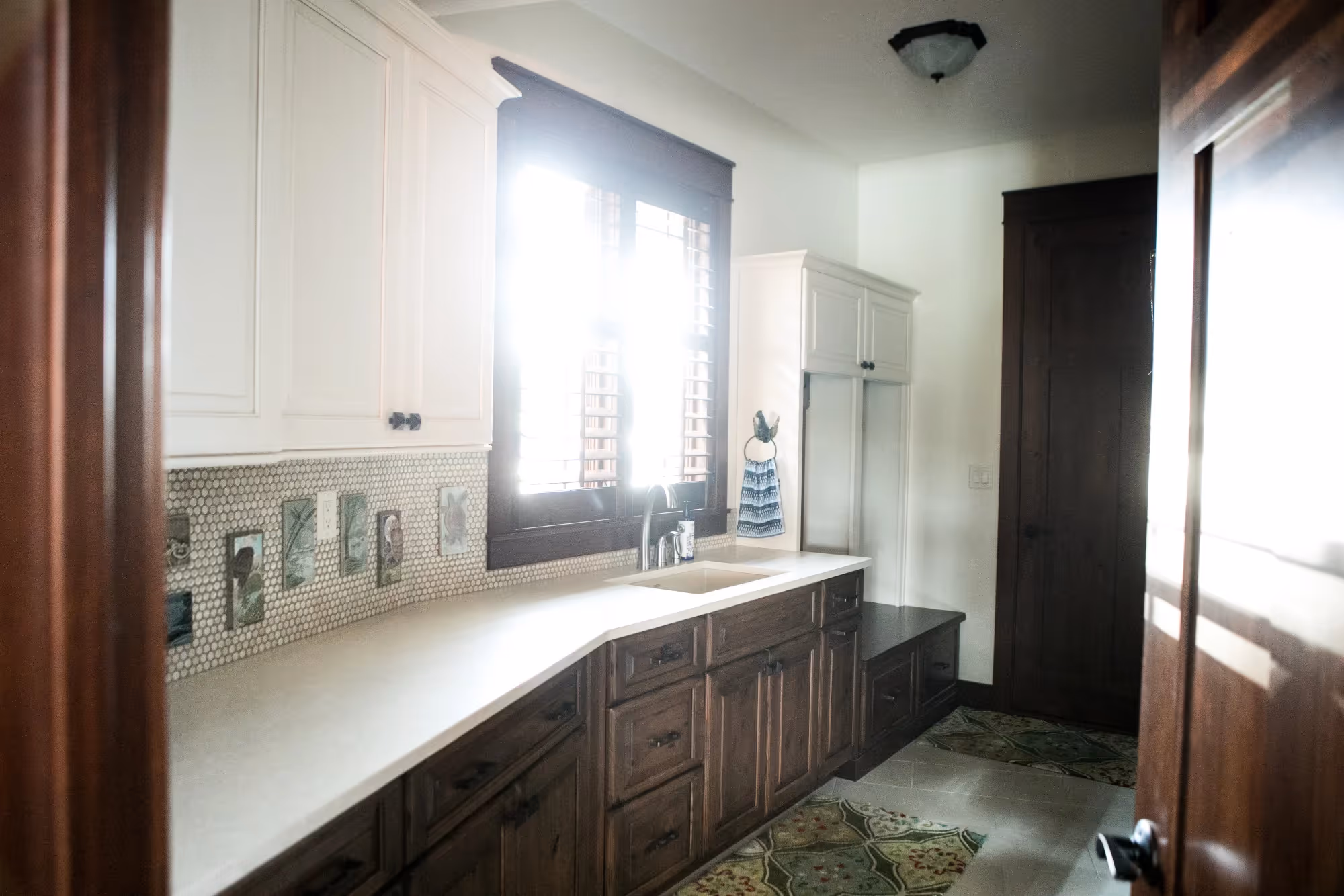 Bright kitchen with large window and extensive counter space
