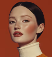 Close-up of a woman's face seen through a textured glass, creating a blurred and obscured effect.