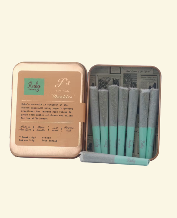 Tin box open showing seven pre-rolled cannabis joints with teal filters labeled Ruby Farms.