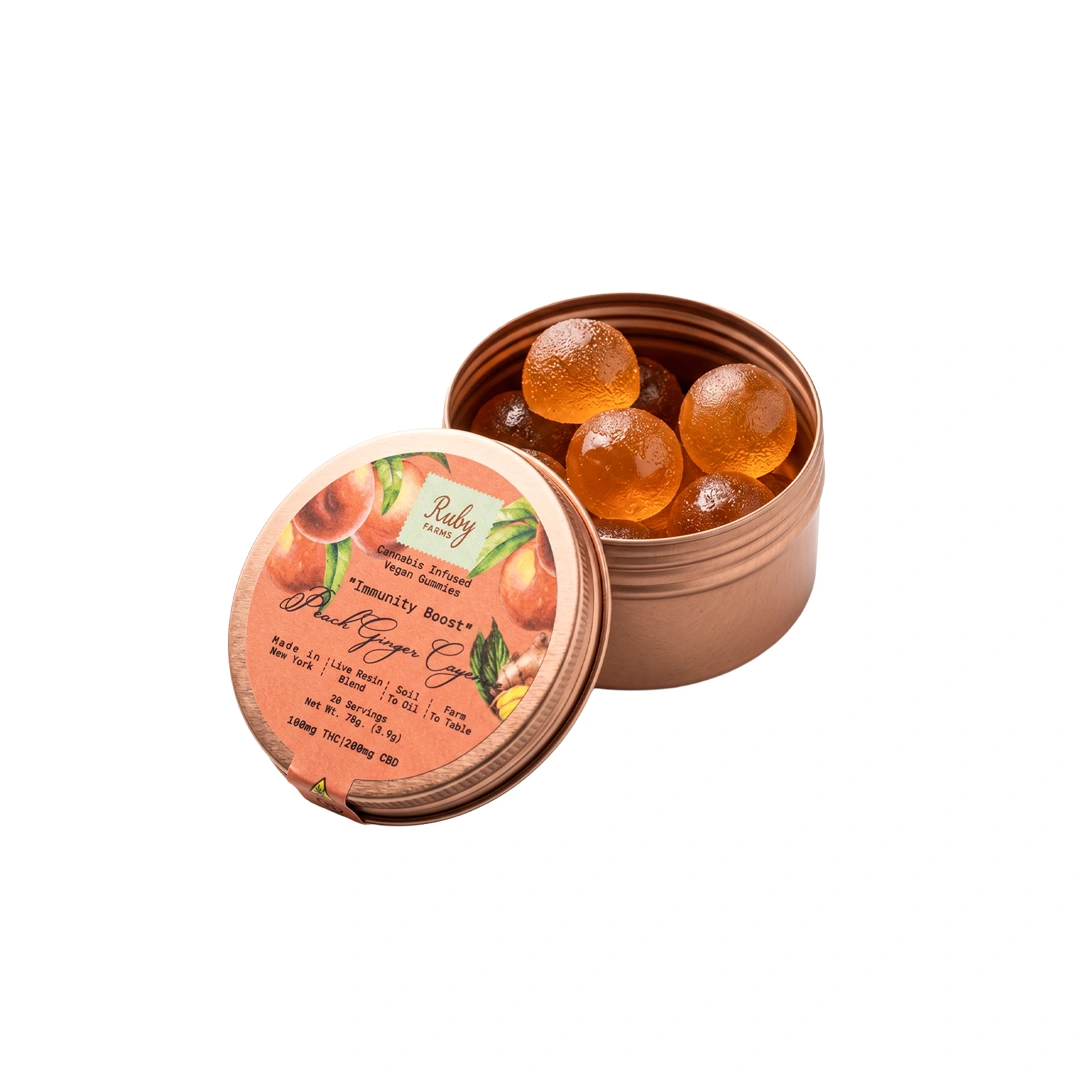 Open copper tin with seven artisan pre-rolled cannabis joints labeled Strawberry Guava hybrid.