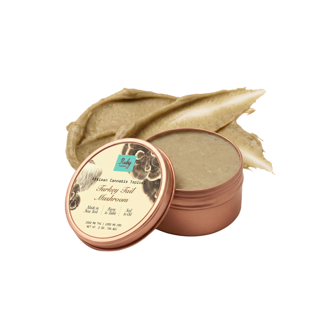 Open copper tin with seven artisan pre-rolled cannabis joints labeled Strawberry Guava hybrid.
