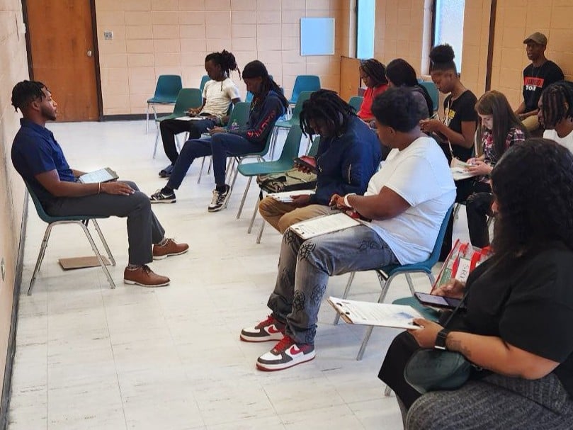 Hoston runs a life insurance workshop at May Park Augusta