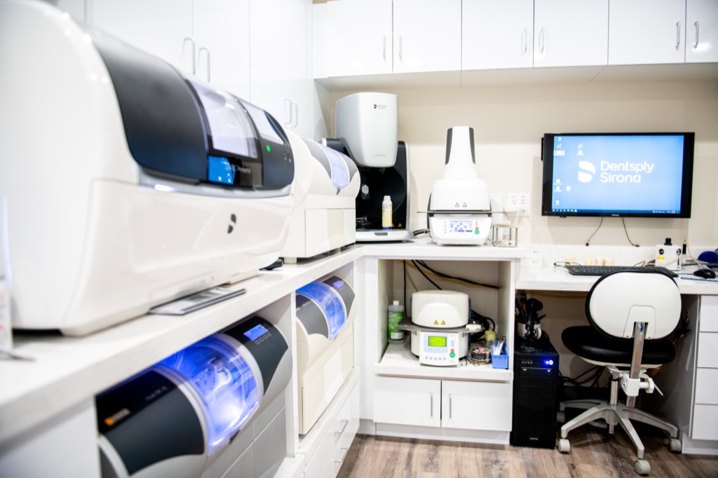 In-office dental lab at Bryan Ritchey DDS Houston featuring Primescan, Primemill, and Primeprint 3D printing technology