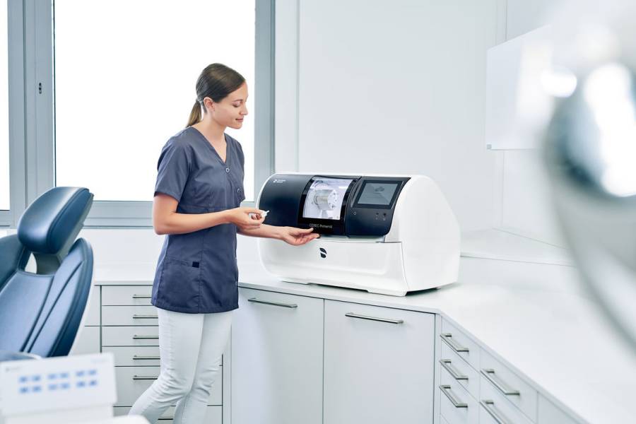Primemill chairside milling unit fabricating a dental crown in-office