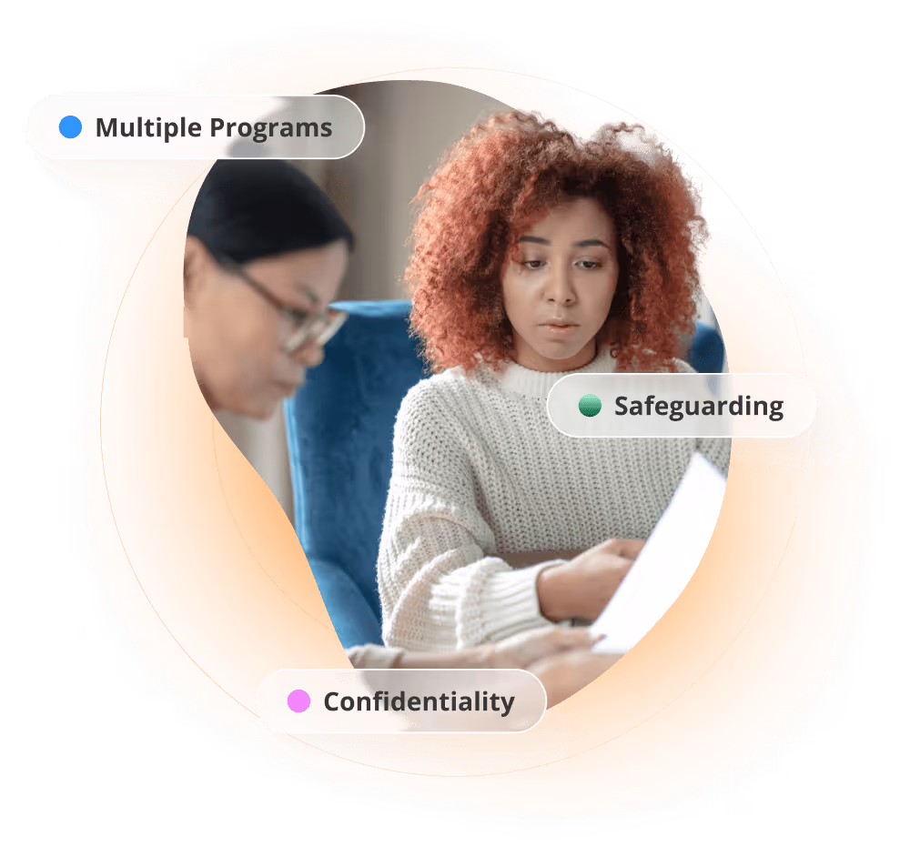 Two women discussing papers, overlaid with text bubbles reading Multiple Programs, Safeguarding, and Confidentiality.